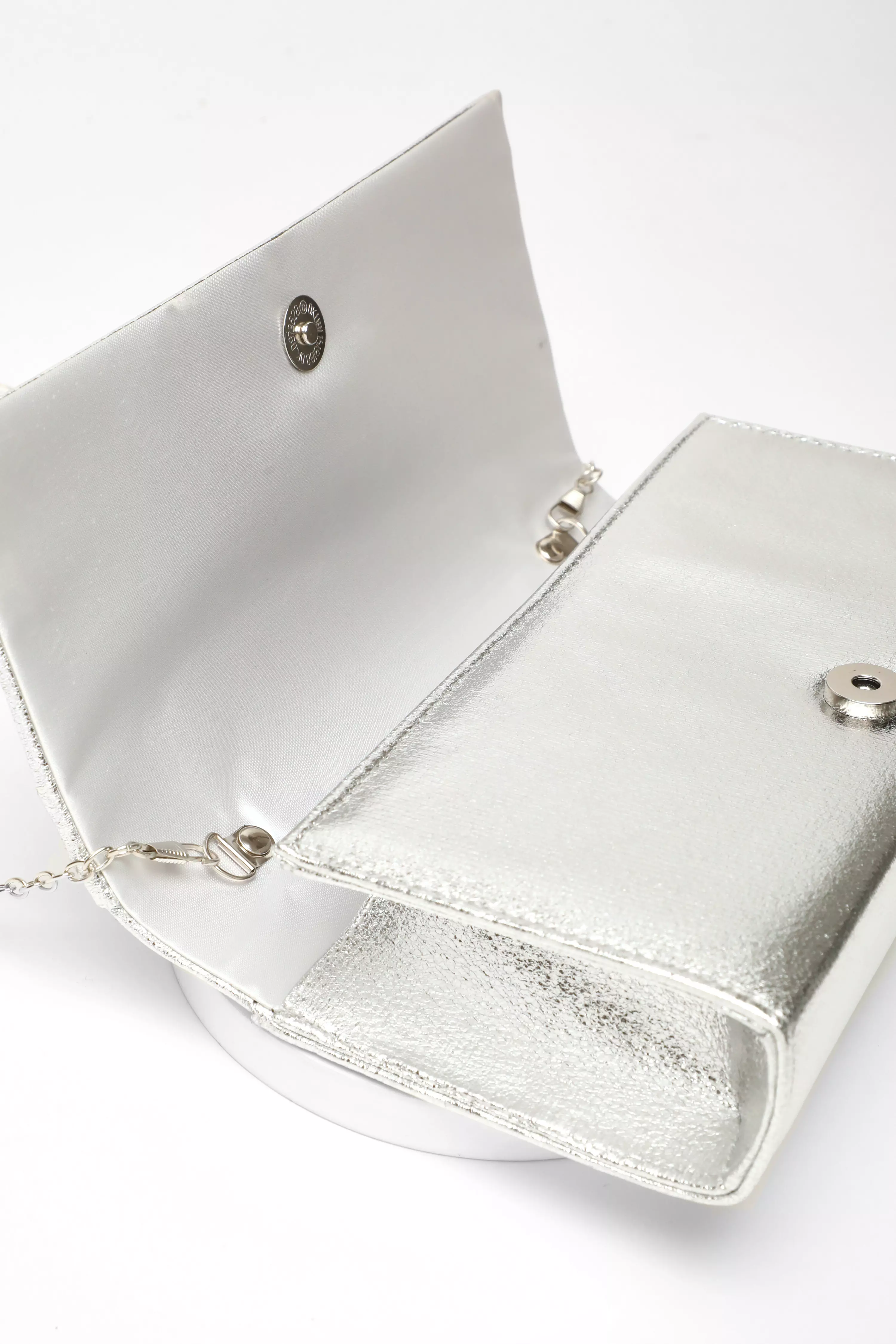 Silver Foil Twist Clutch Bag