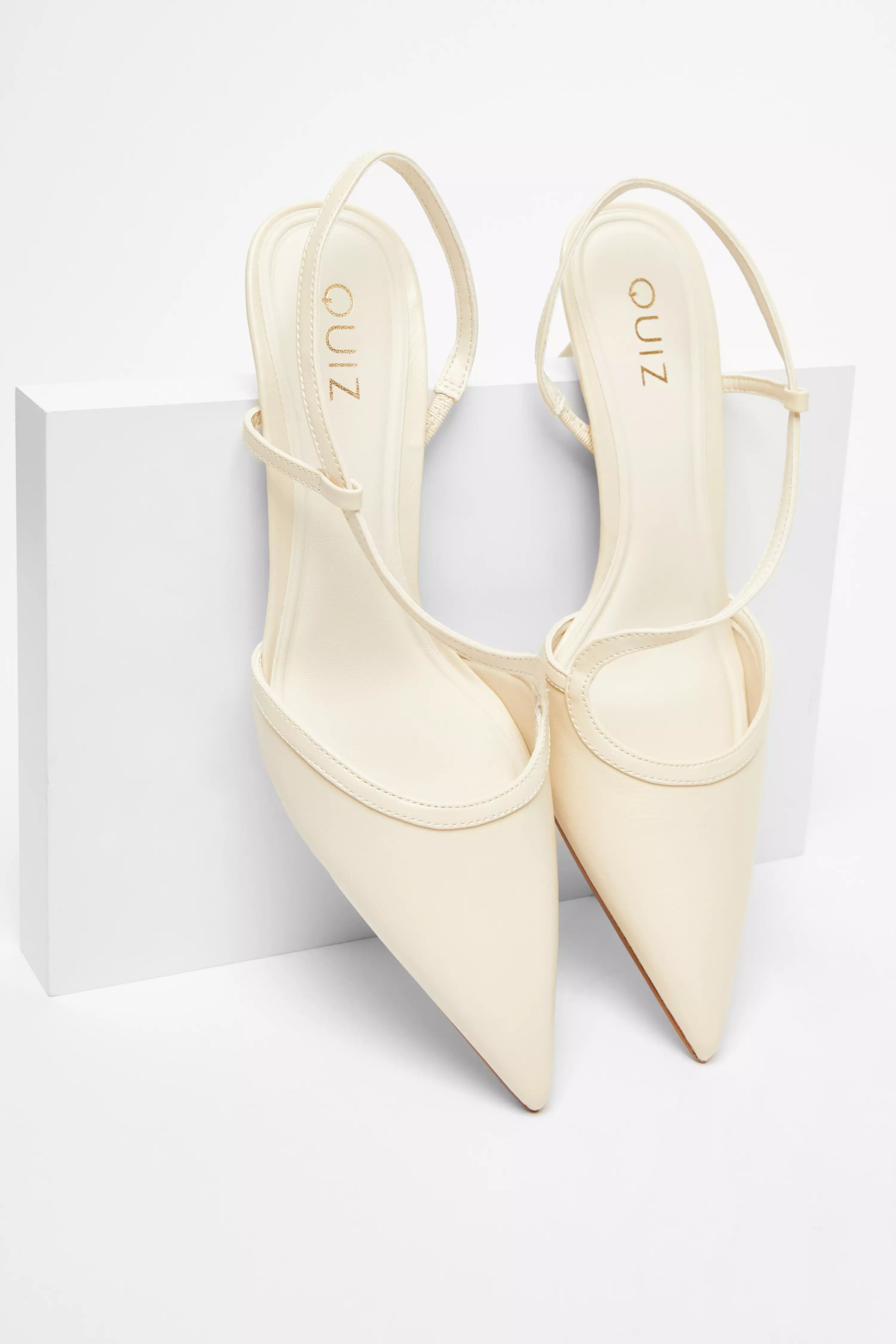 Cream Asymmetric Court Heels