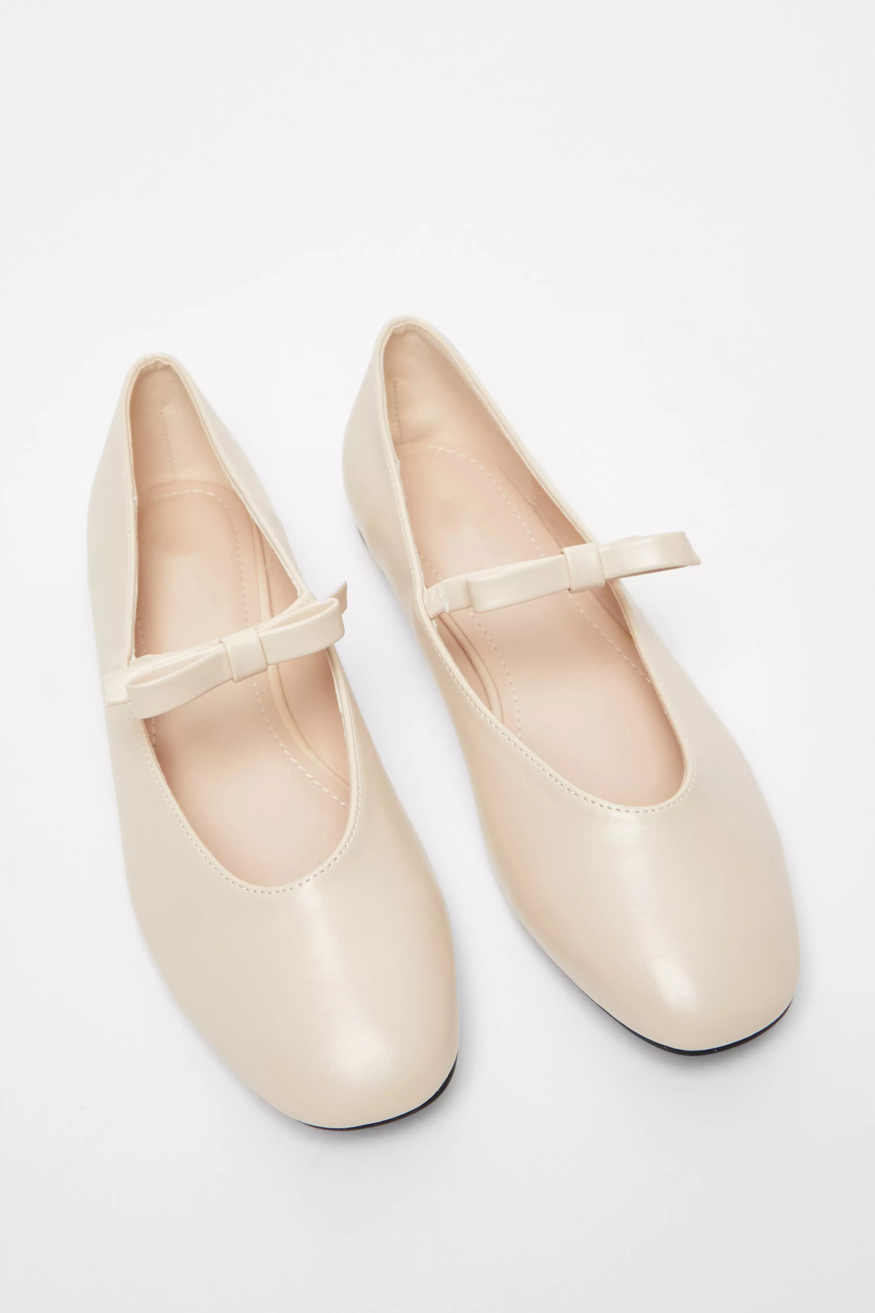 Beige Faux Leather Patent Bow Pumps