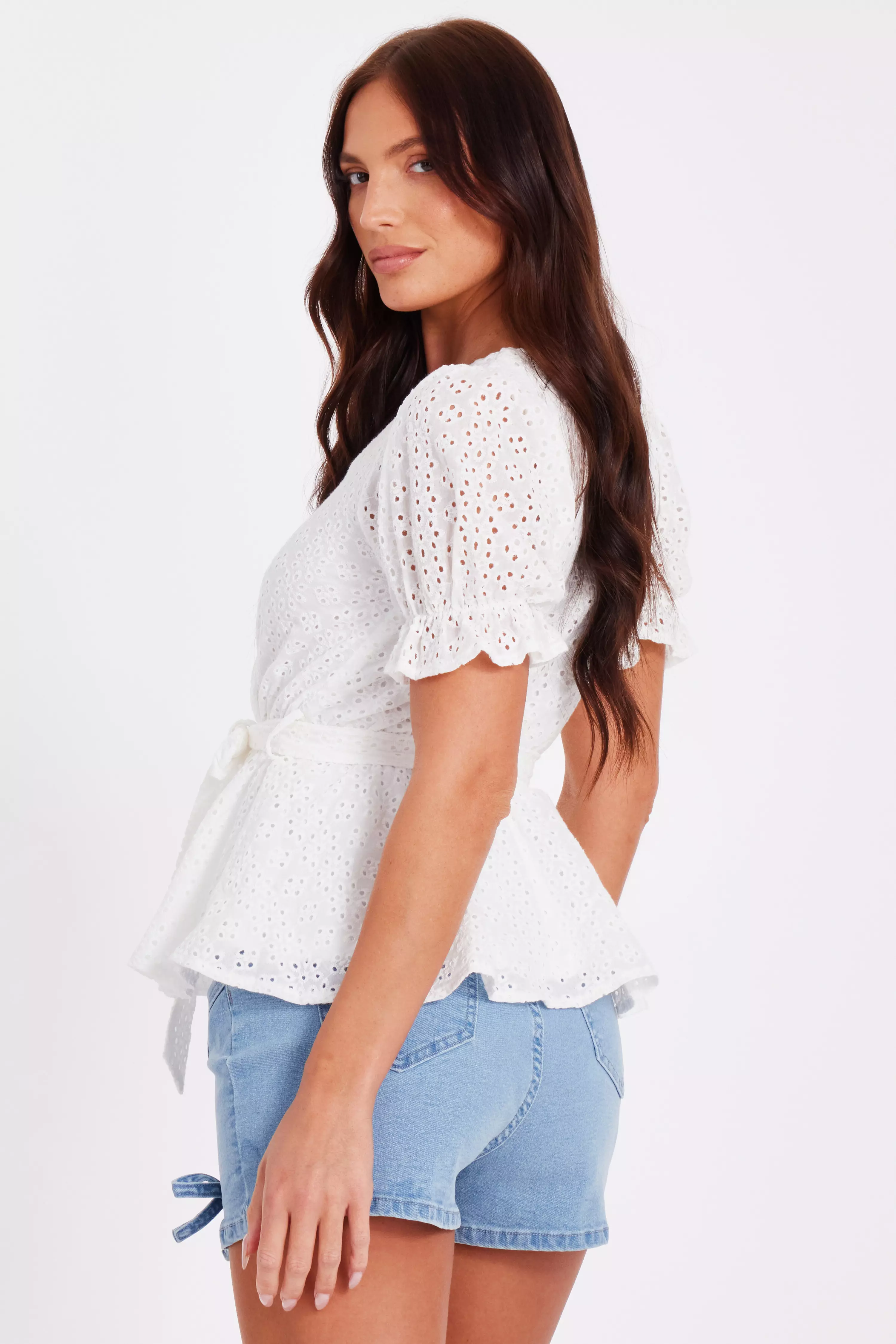 White Embroidered Peplum Top