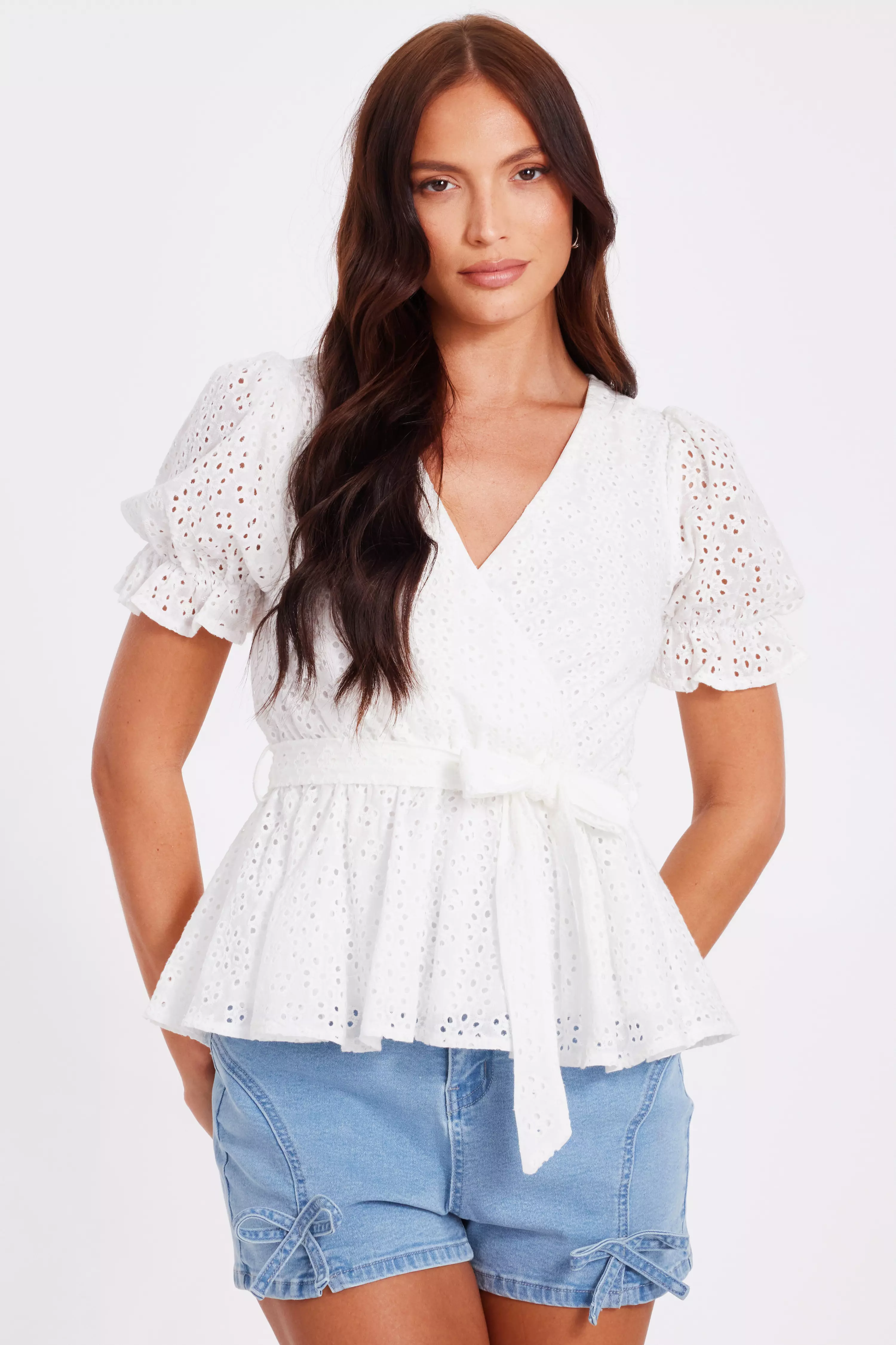 White Embroidered Peplum Top
