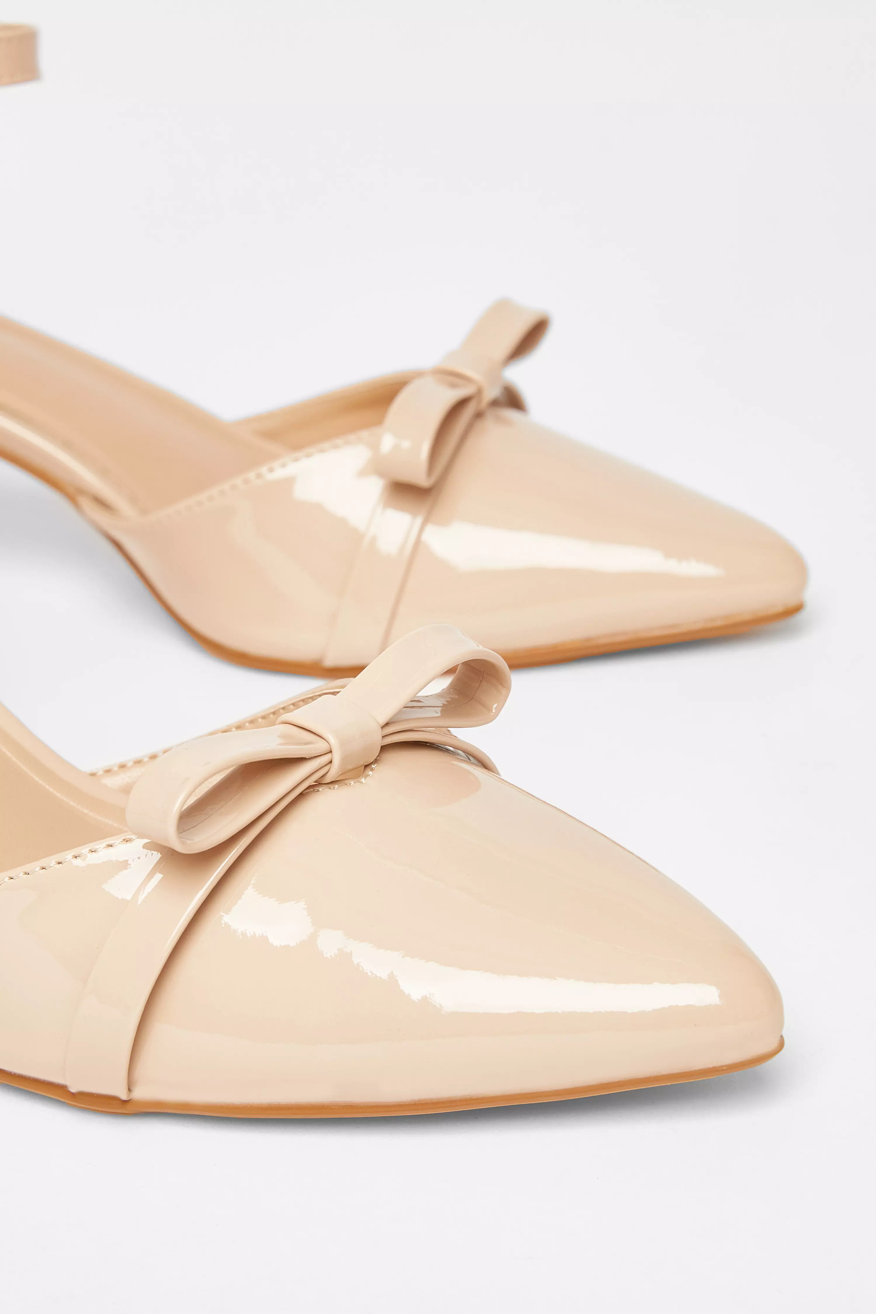 Nude Patent Bow Court Heels