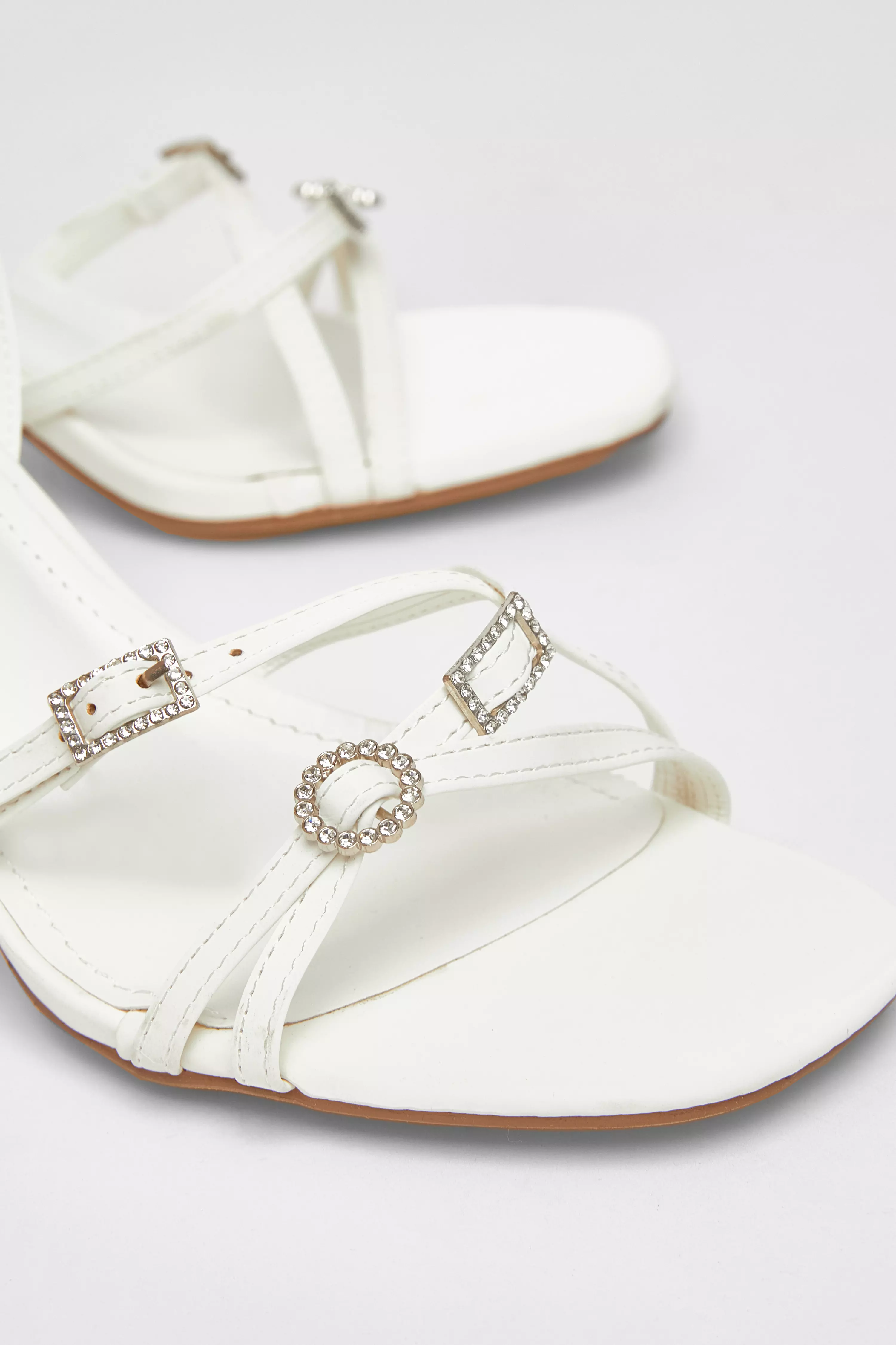 White Buckle Strap Heels
