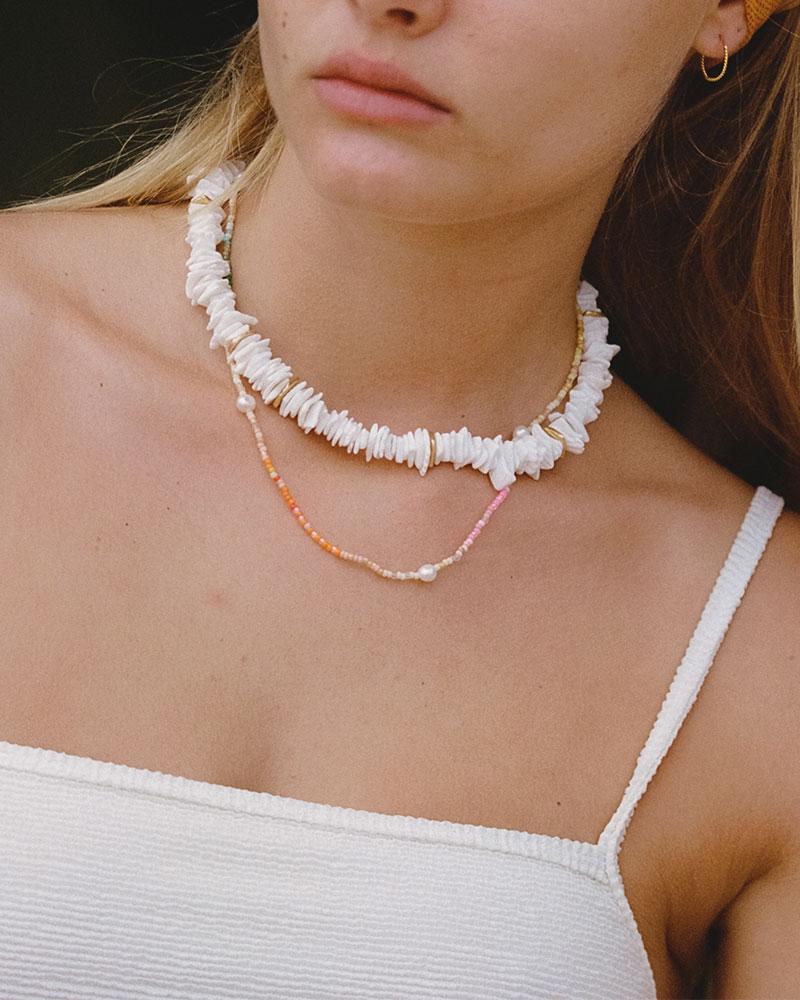 What's the solution to layering two necklaces without them getting tangled?  : r/jewelry