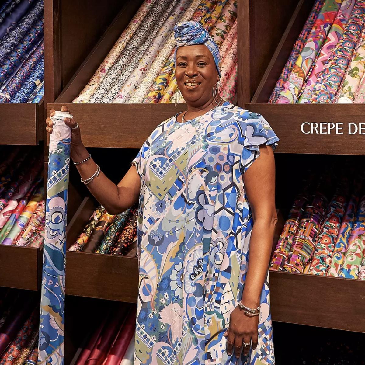 Liberty Staff Holding Fabric