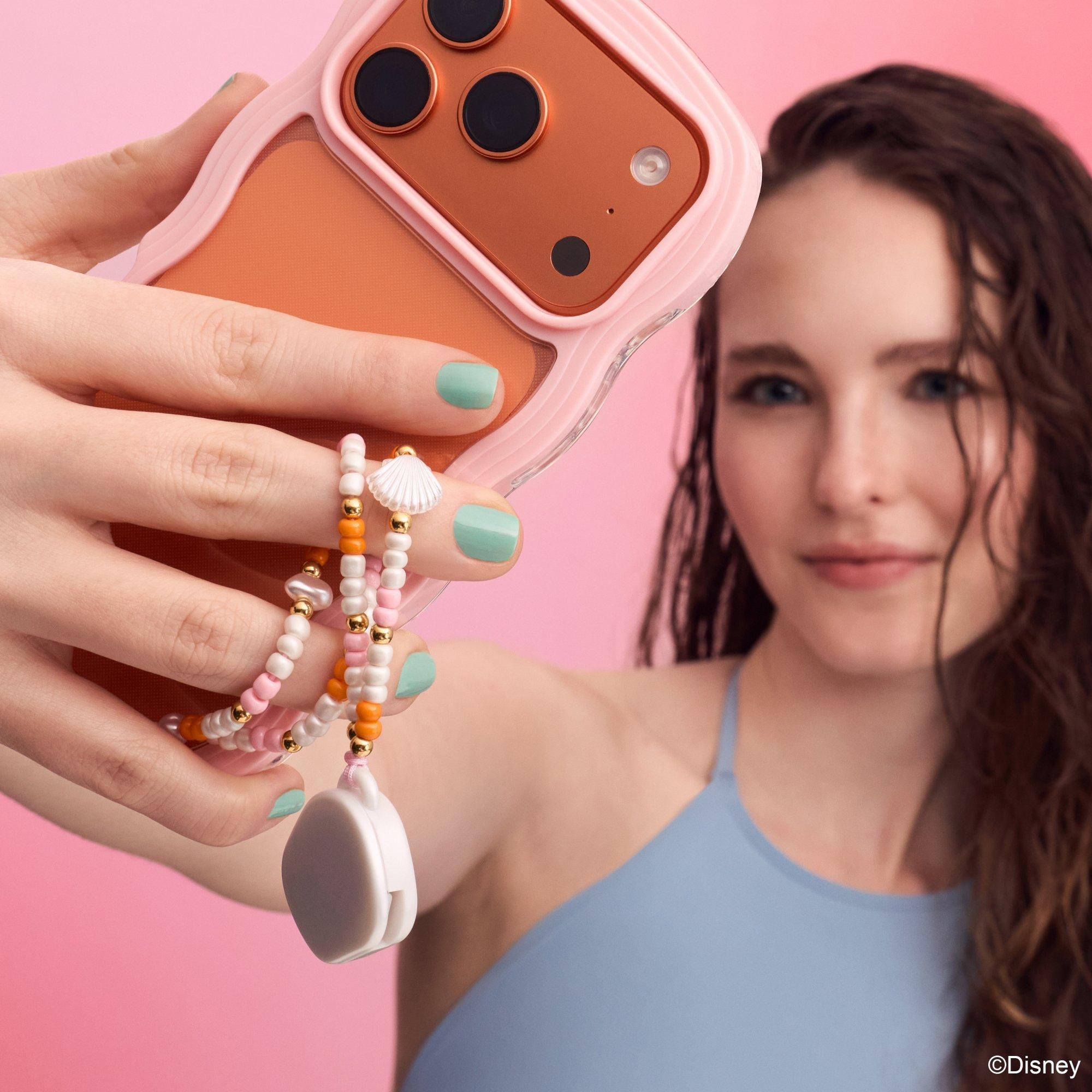 Balsamo labbra con charm per telefono Disney HE LITTLE MERMAID.