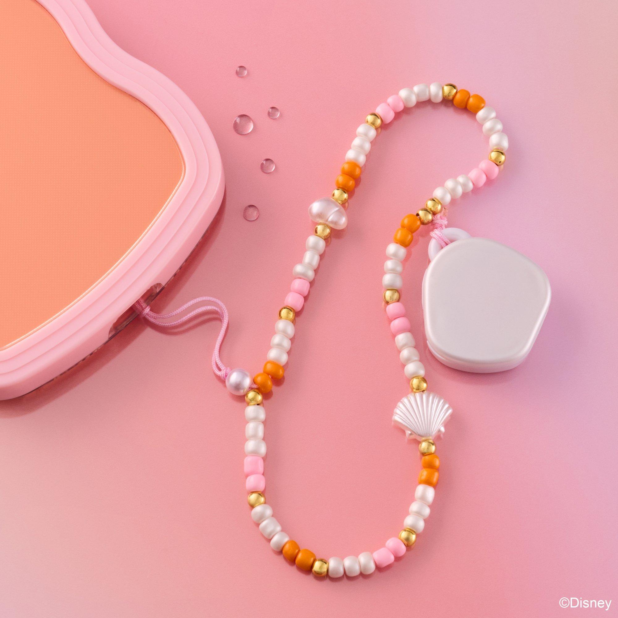 Balsamo labbra con charm per telefono Disney HE LITTLE MERMAID.