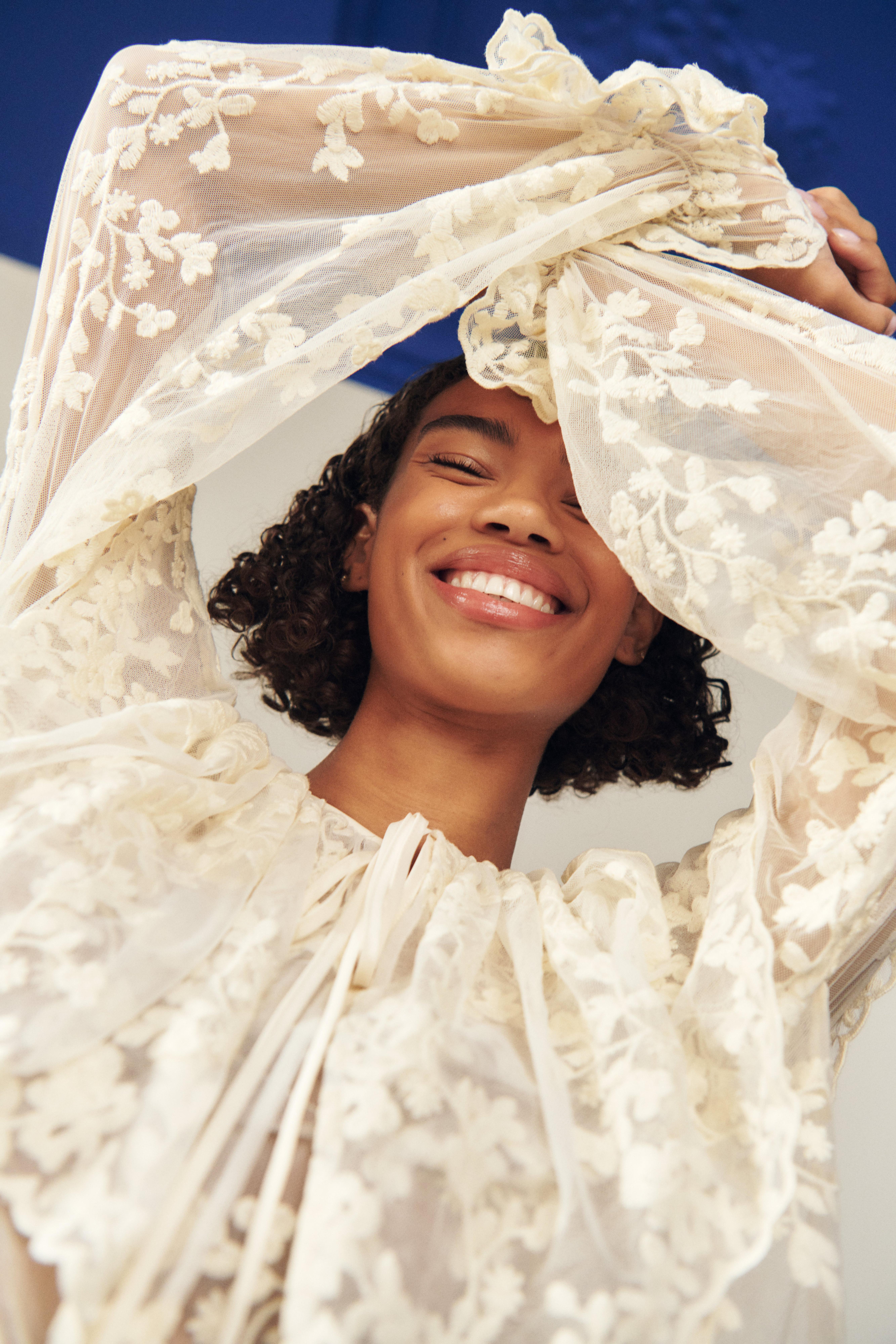 Happy woman in white blouse