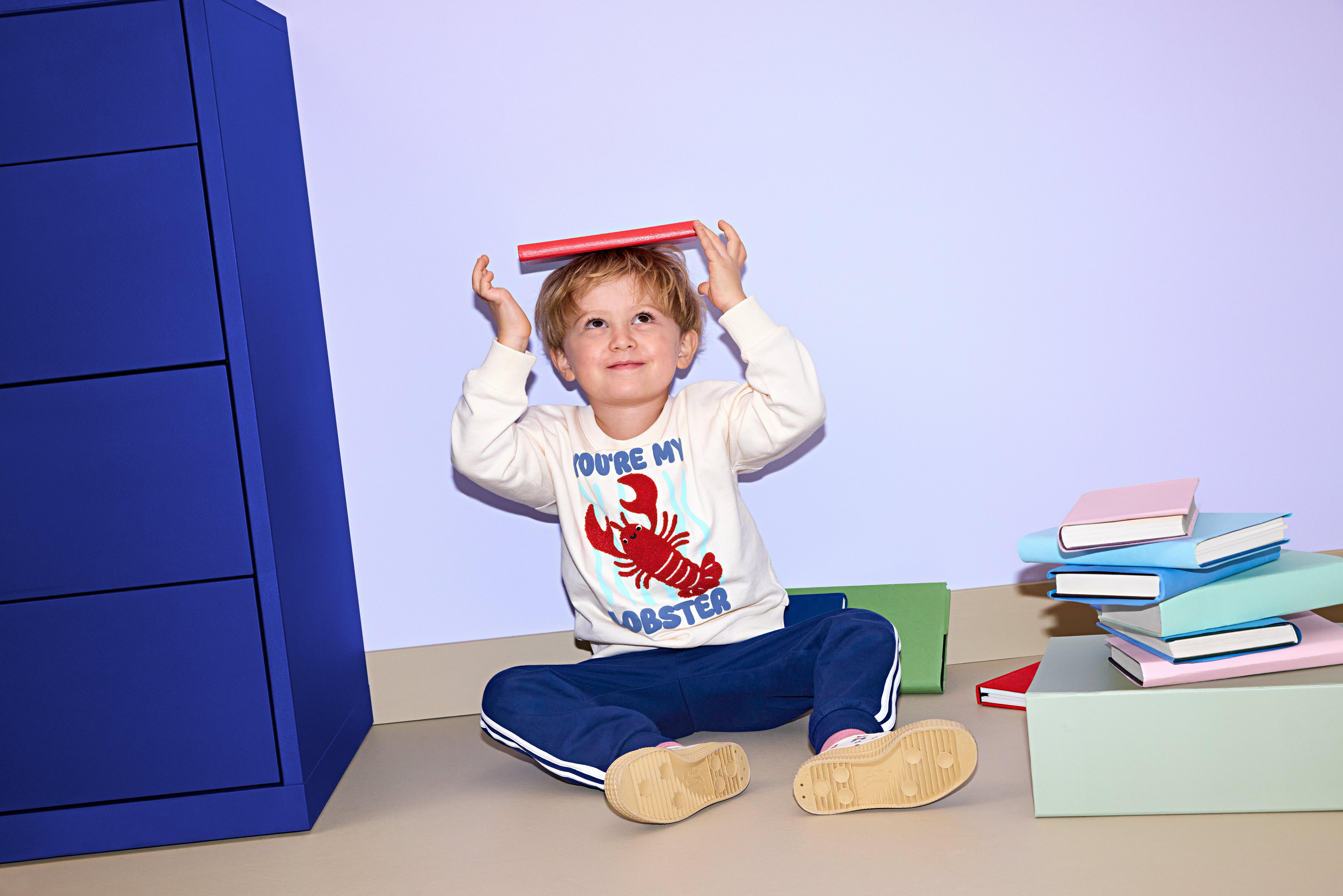 Boy in sweatshirt and joggers