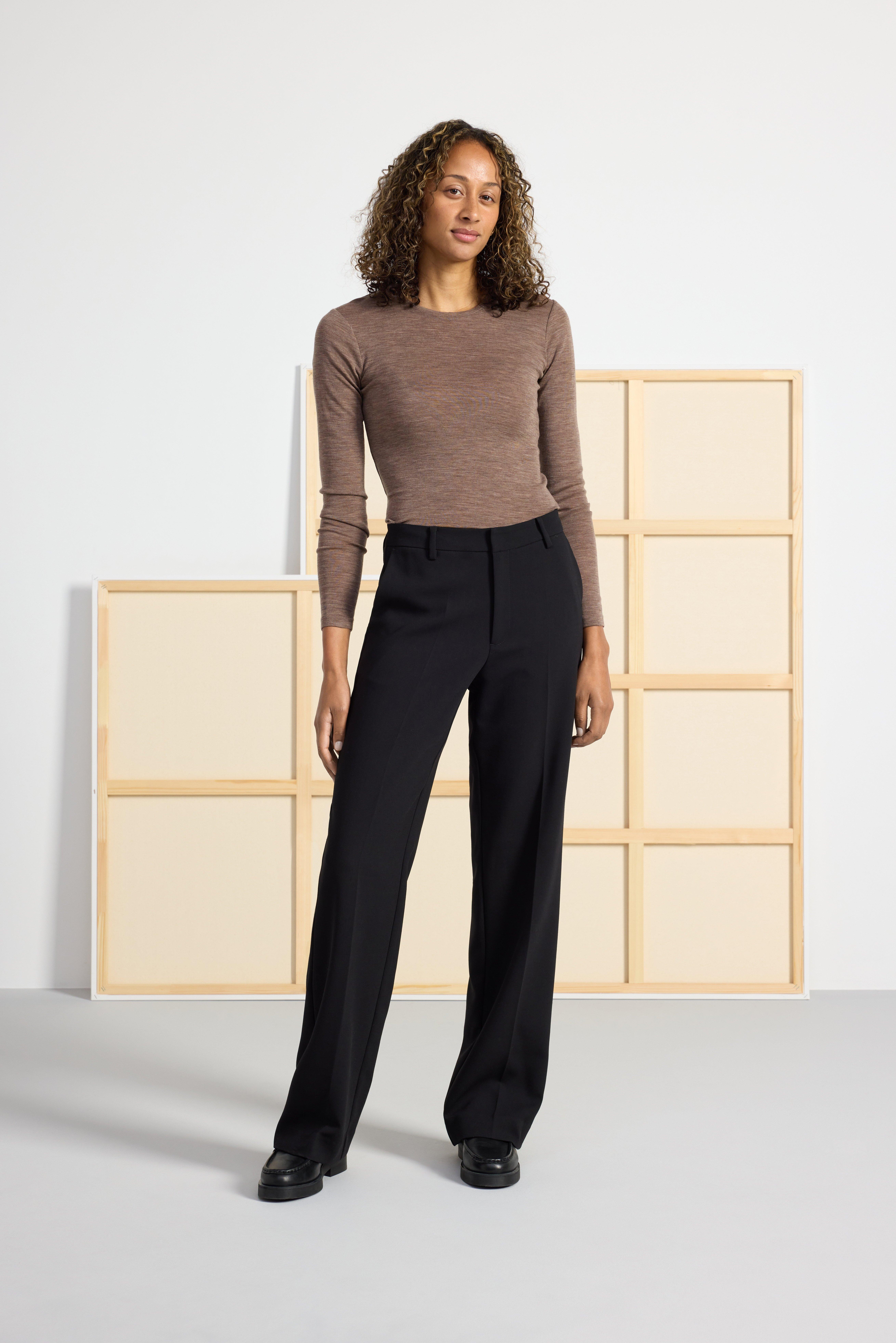 A pair of trousers with longer legs from Lindex.