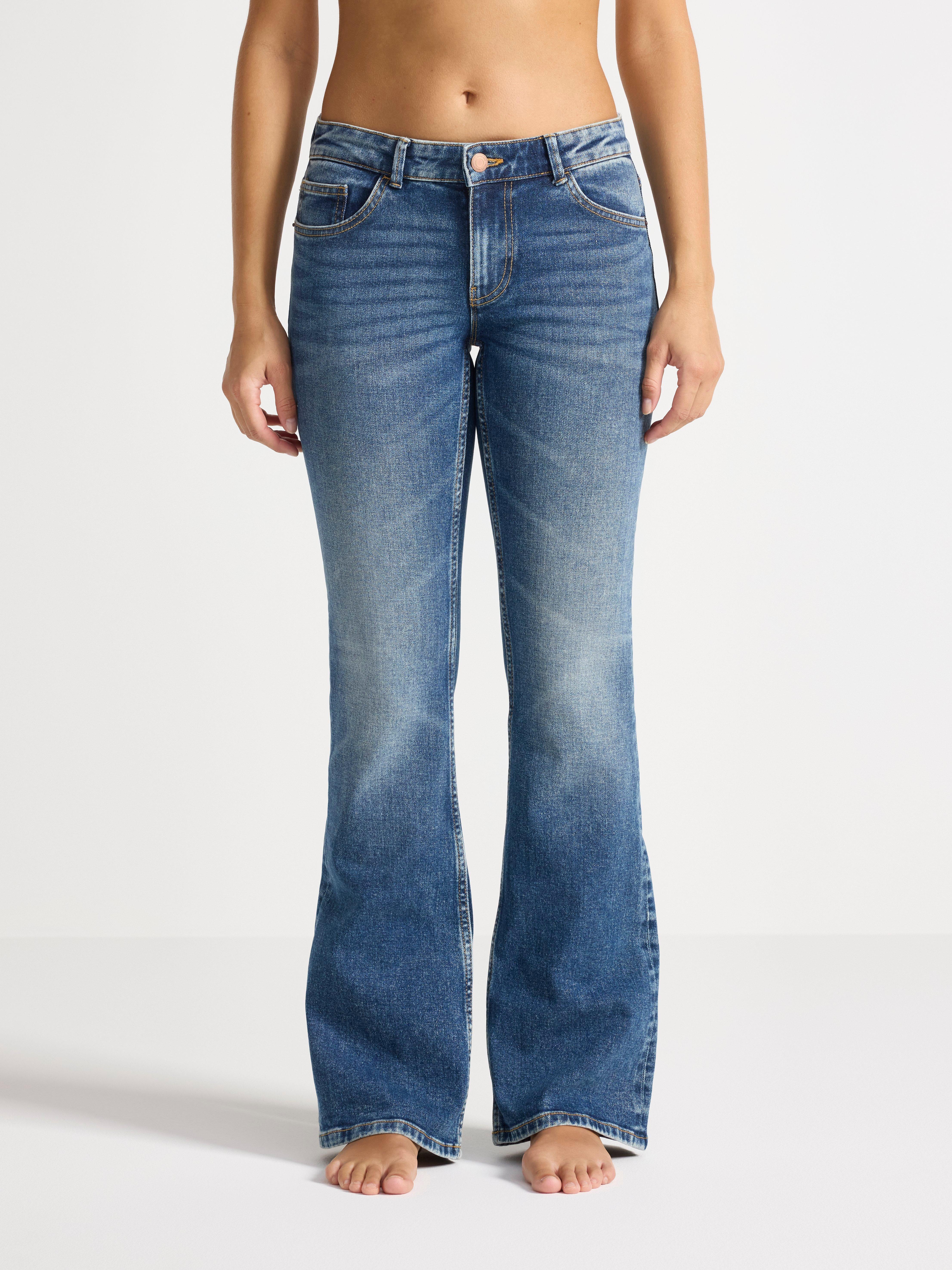 A woman in a pair of Fay jeans.