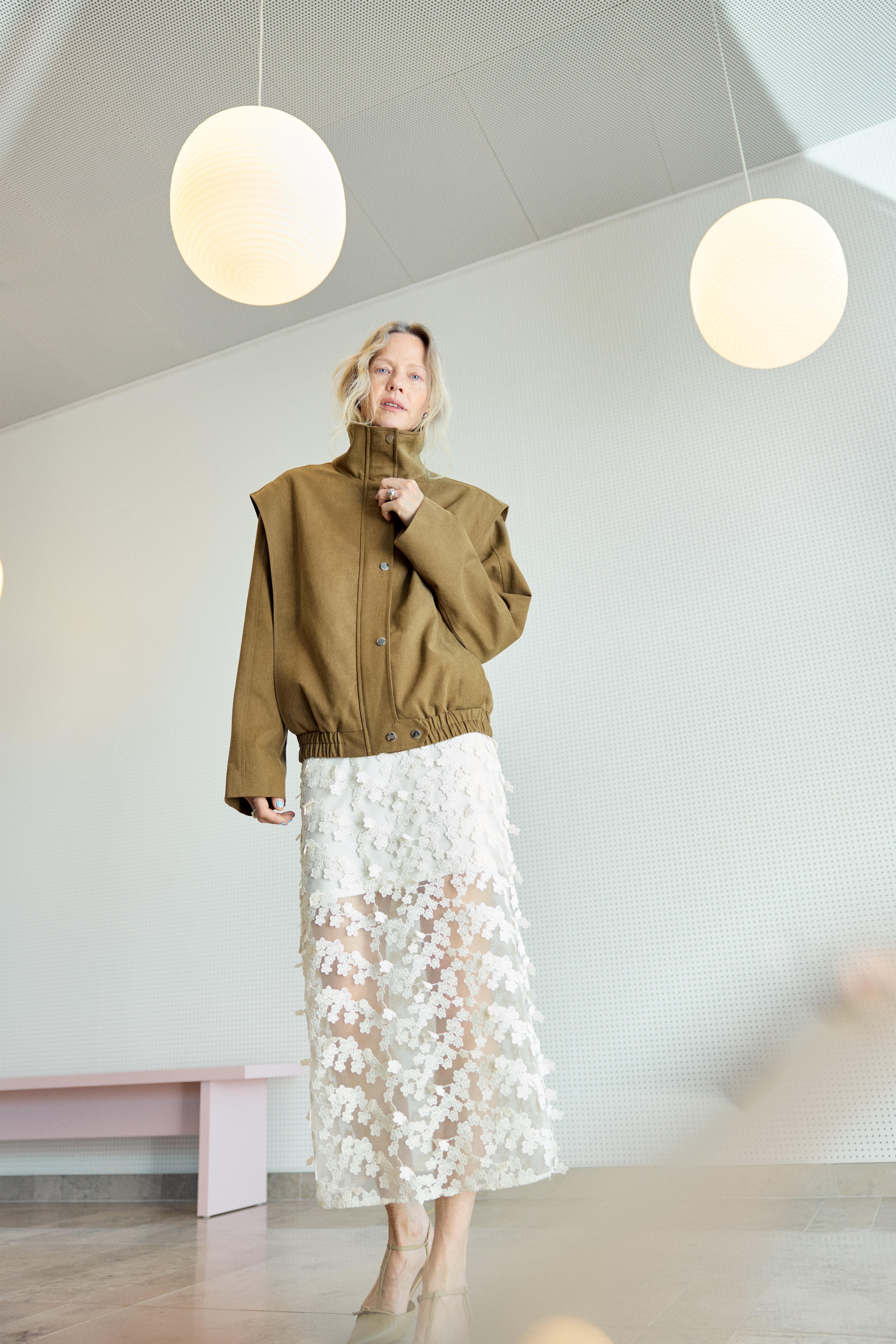 Women in jacket and skirt