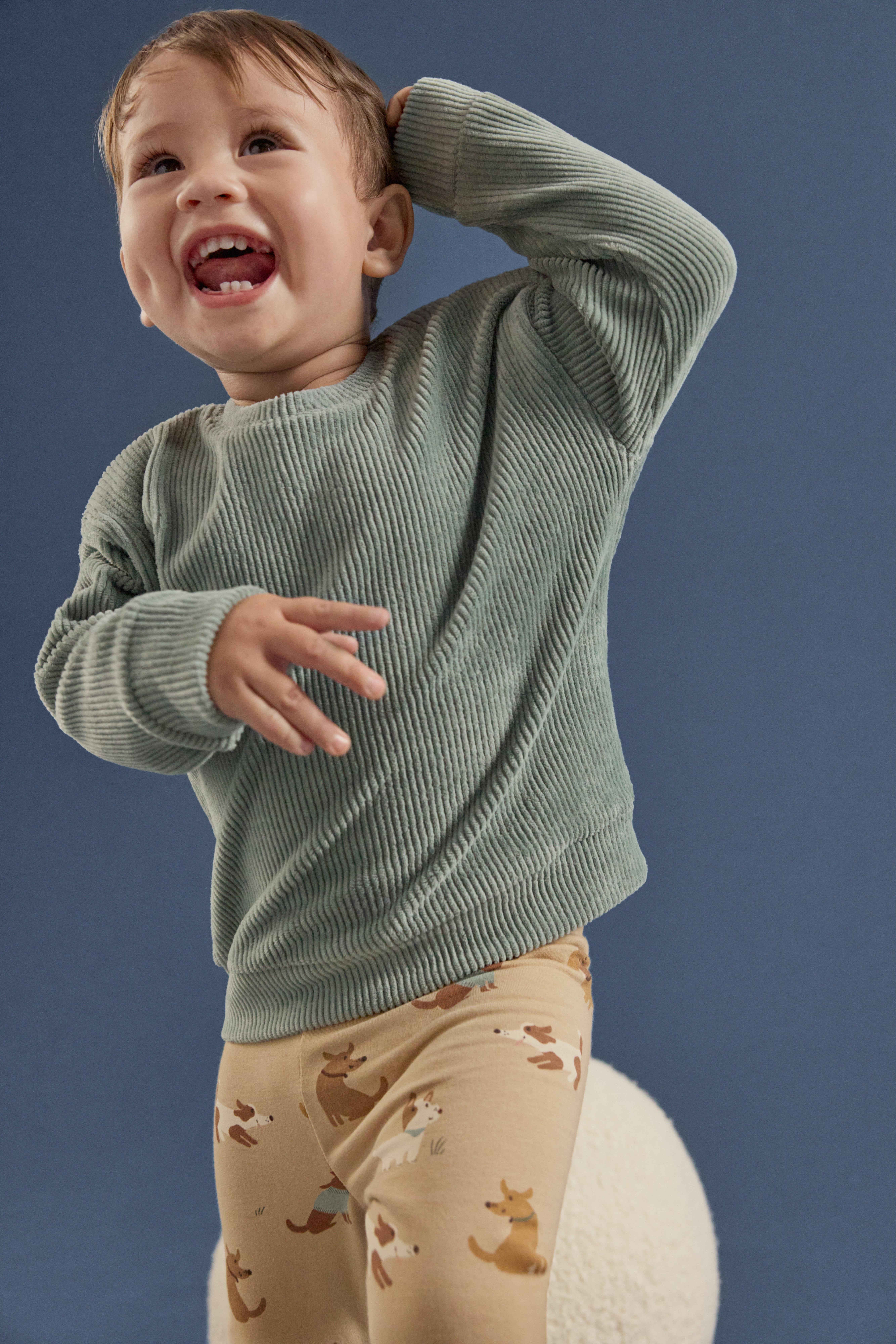 Little boy in autumn clothes