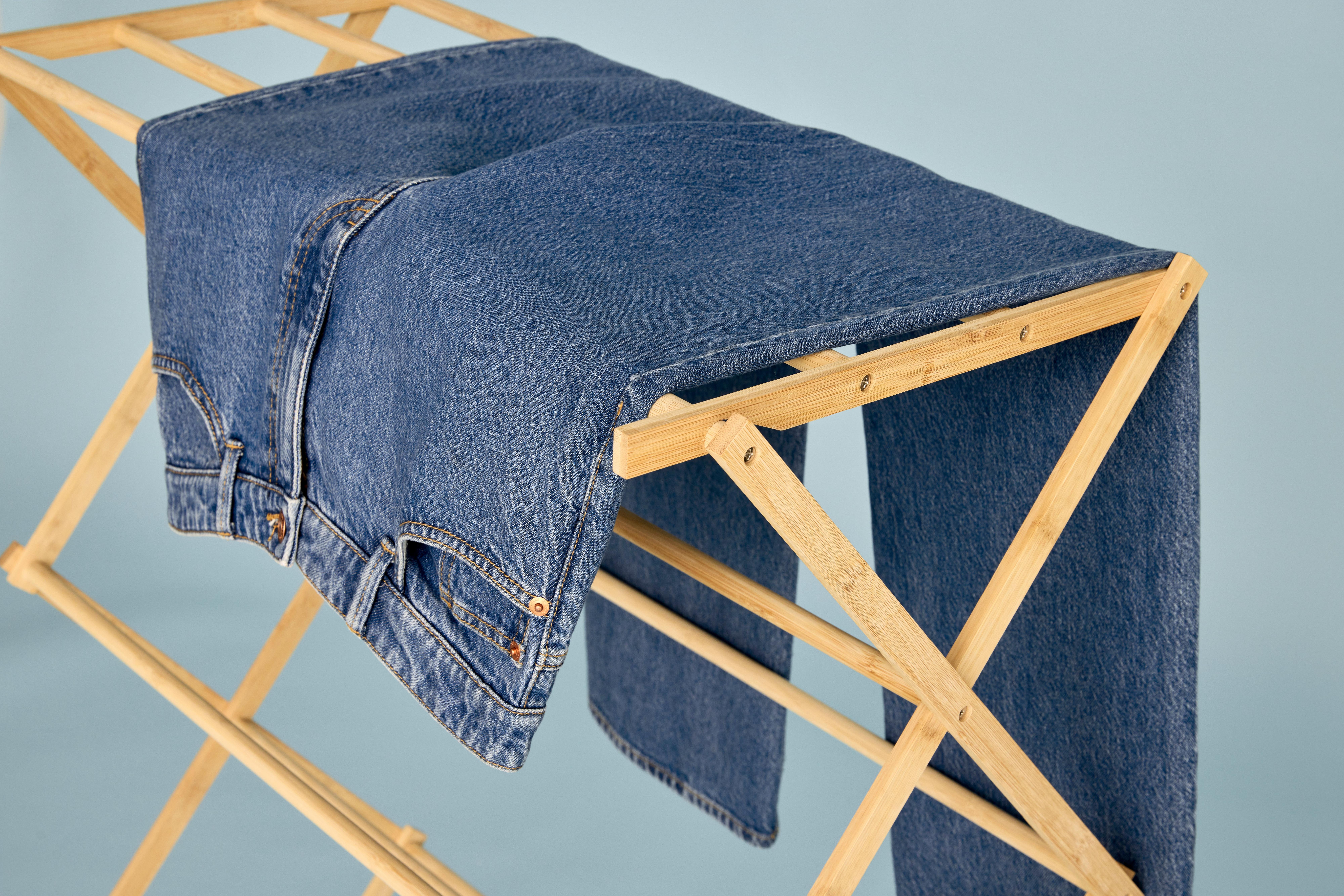 A pair of jeans hanging to dry.