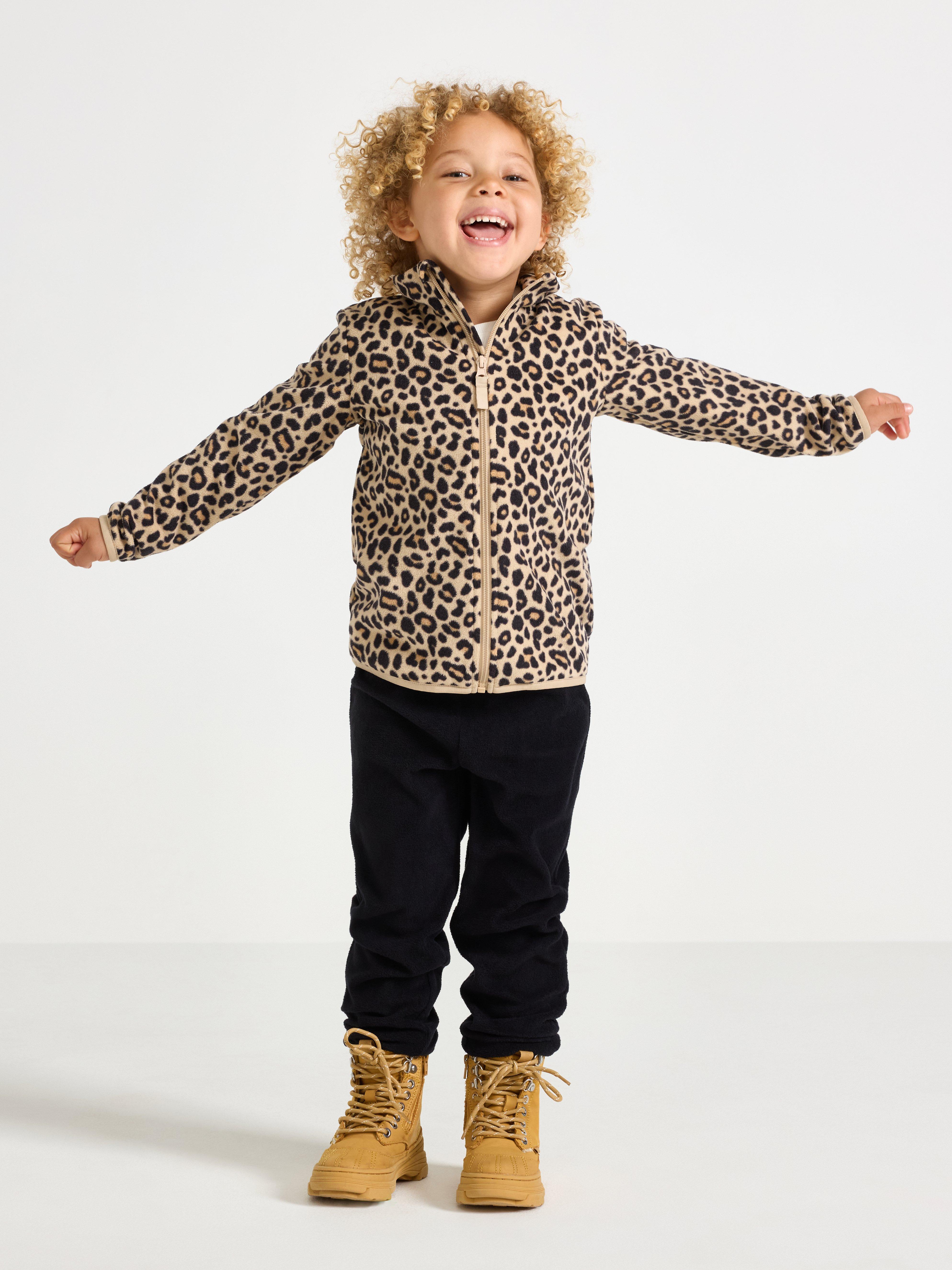 A girl wearing warm and comfortable base layer and a fleece jacket.