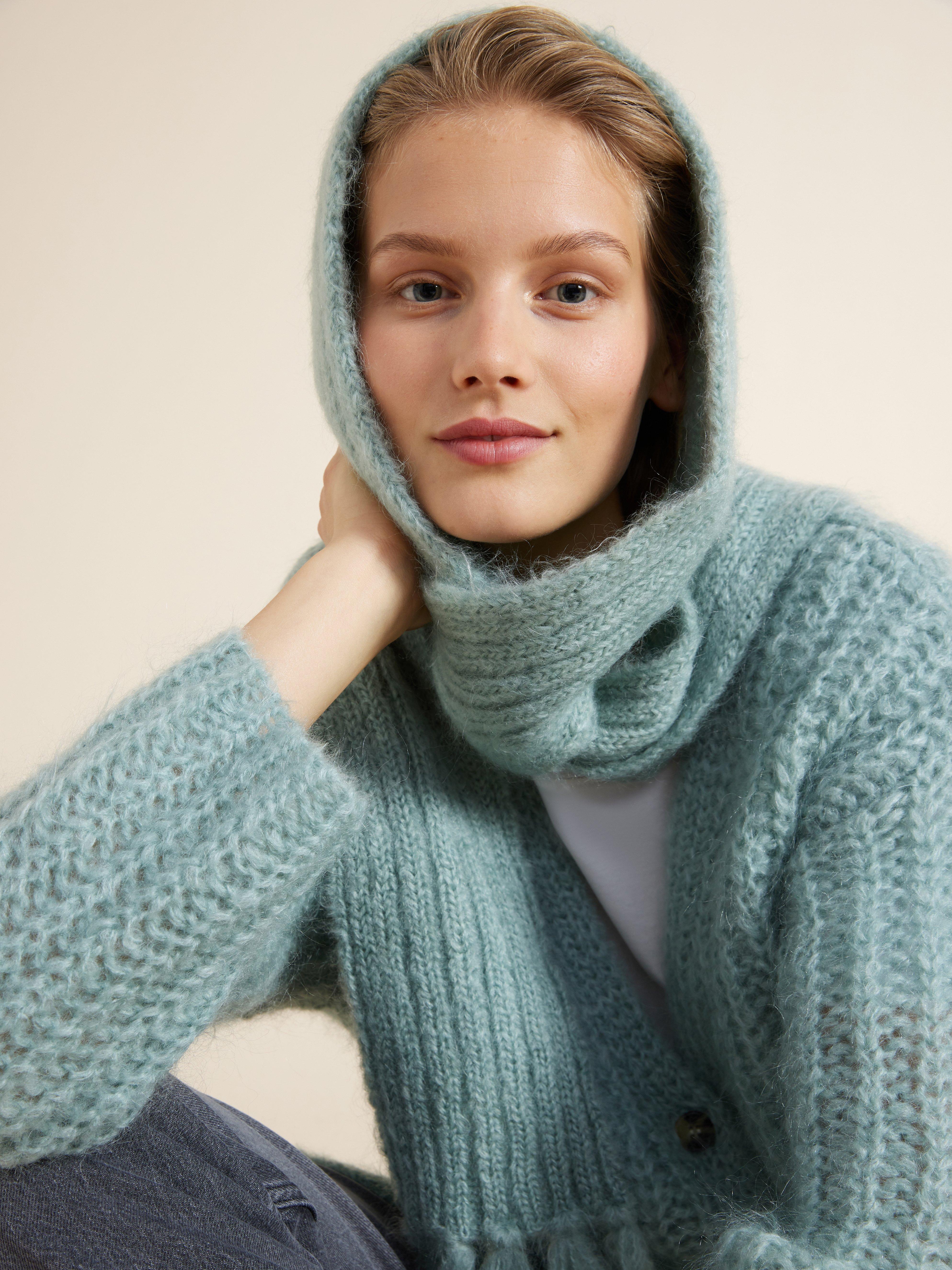 A woman wearing Lindex knitwear.