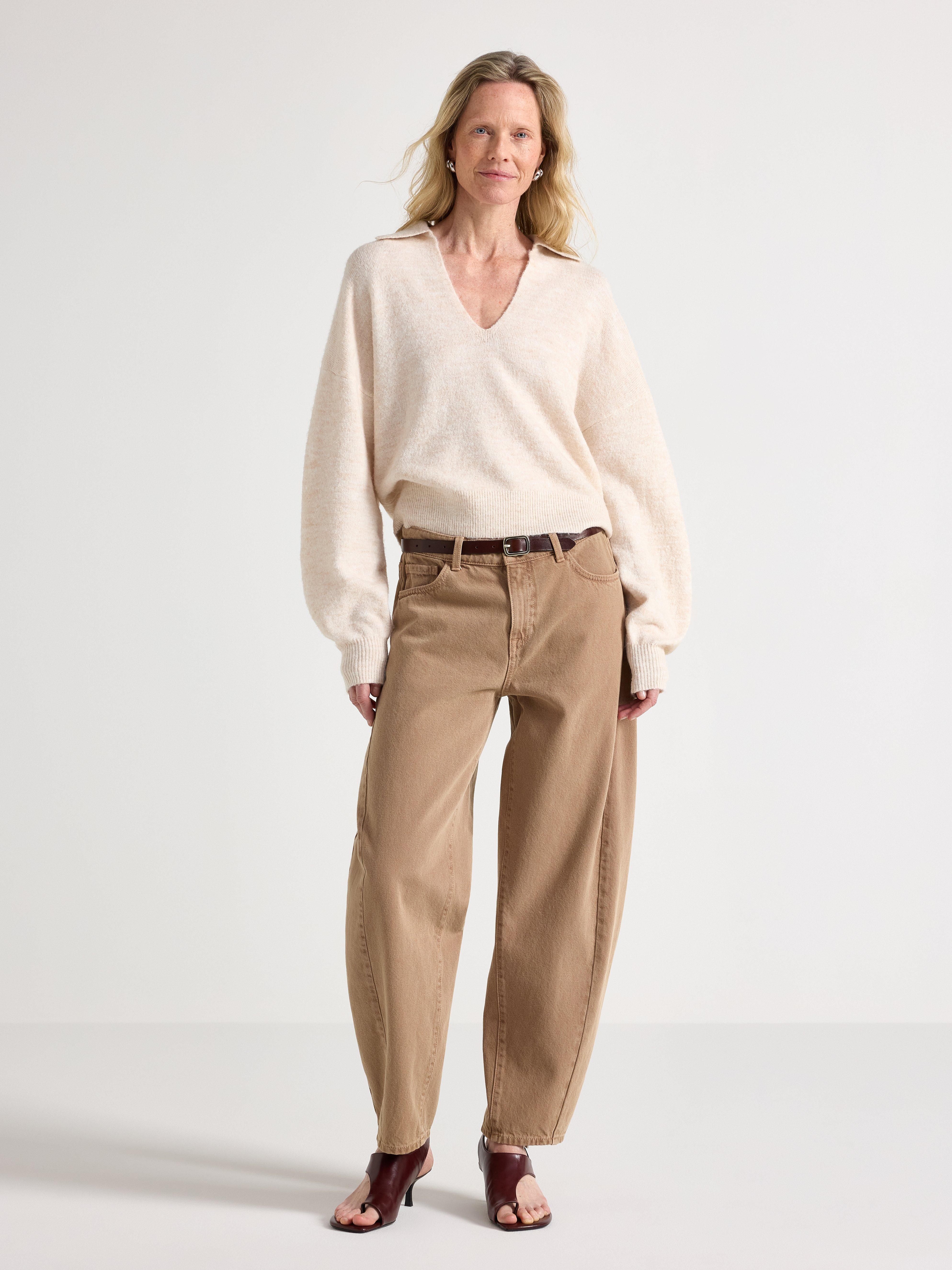 A woman dressed in a casual style.