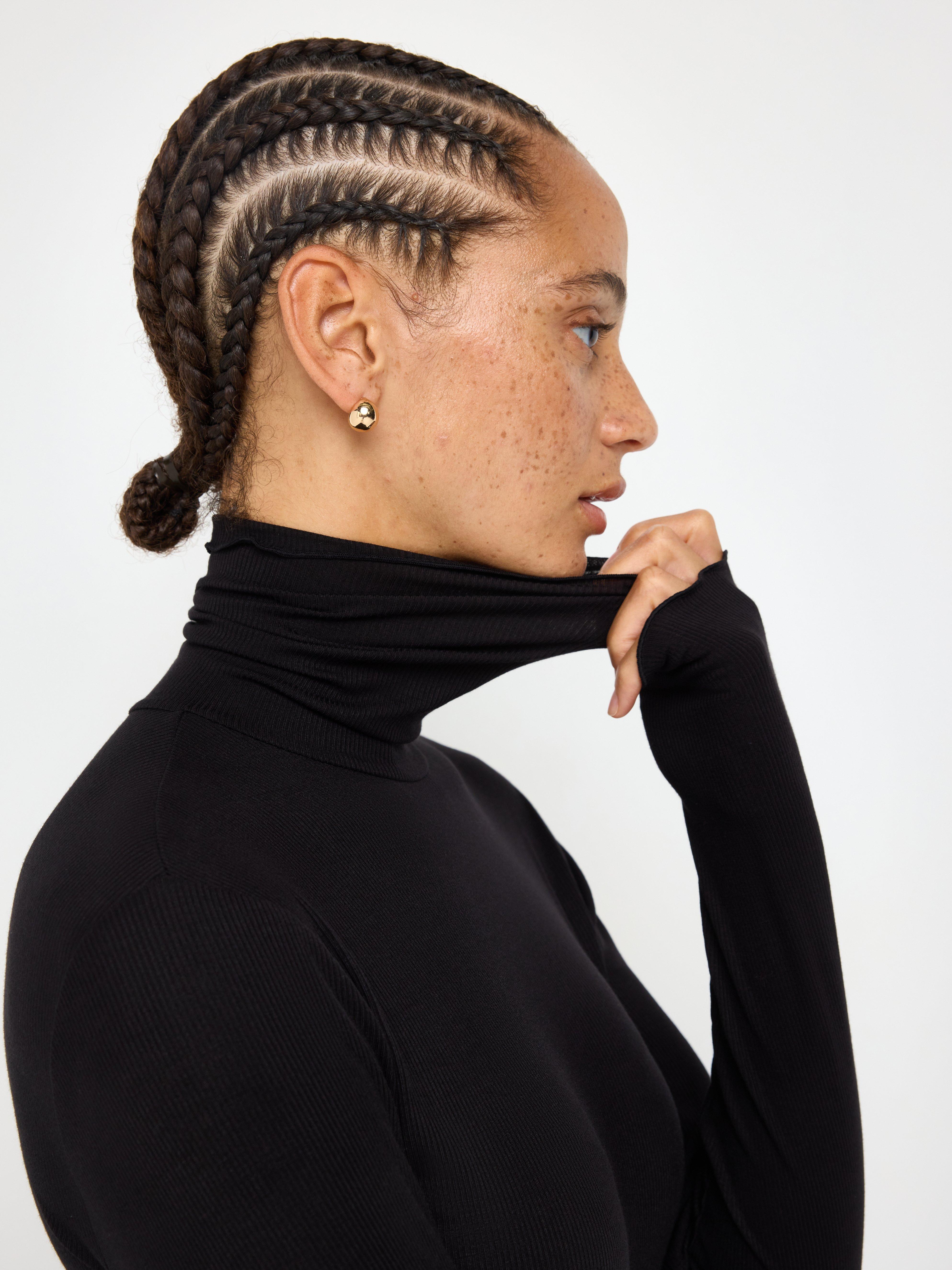 Top med rullekrave - Dame - Sort