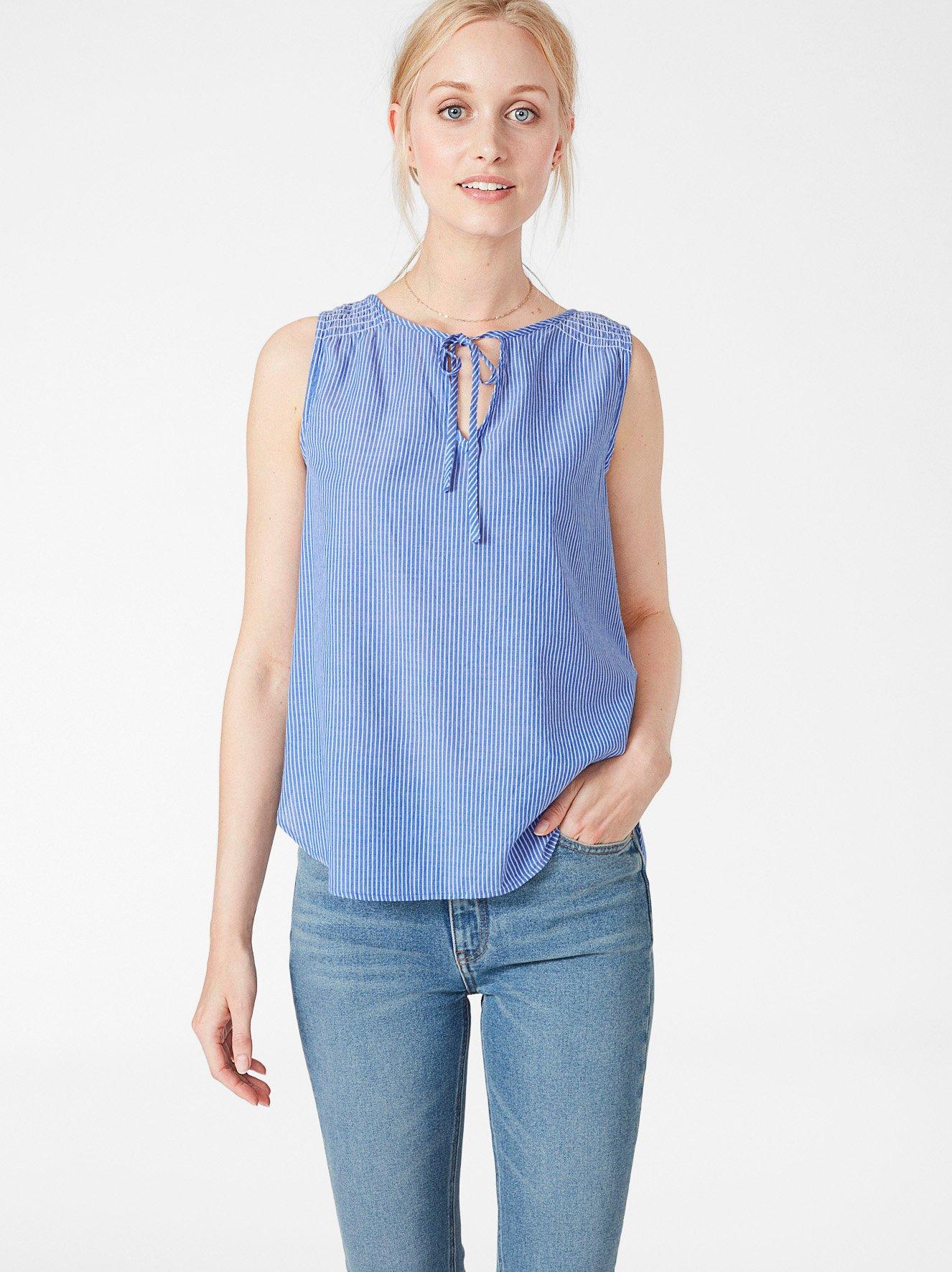 Ermeløs bluse i bomull