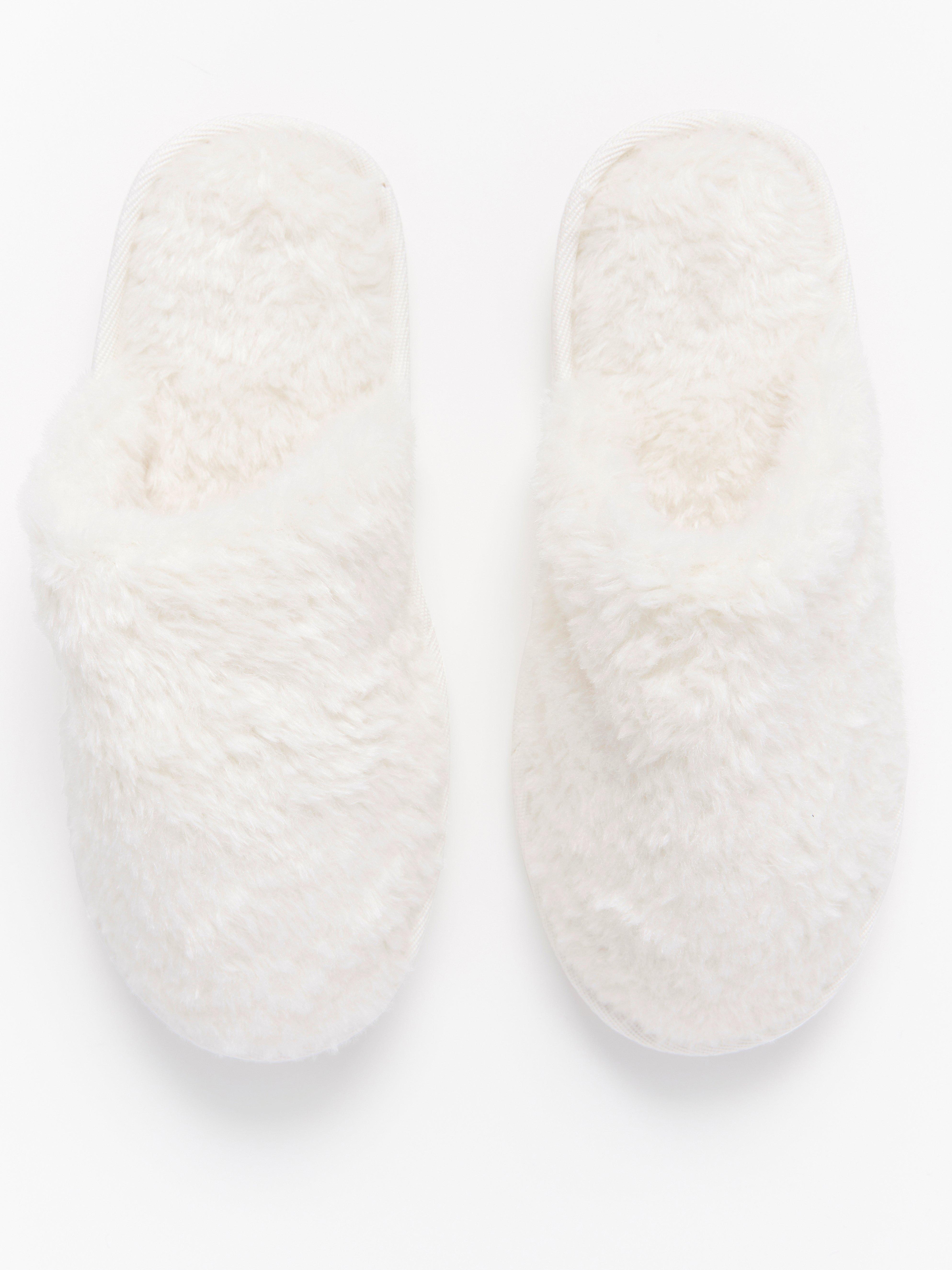 white fur slippers