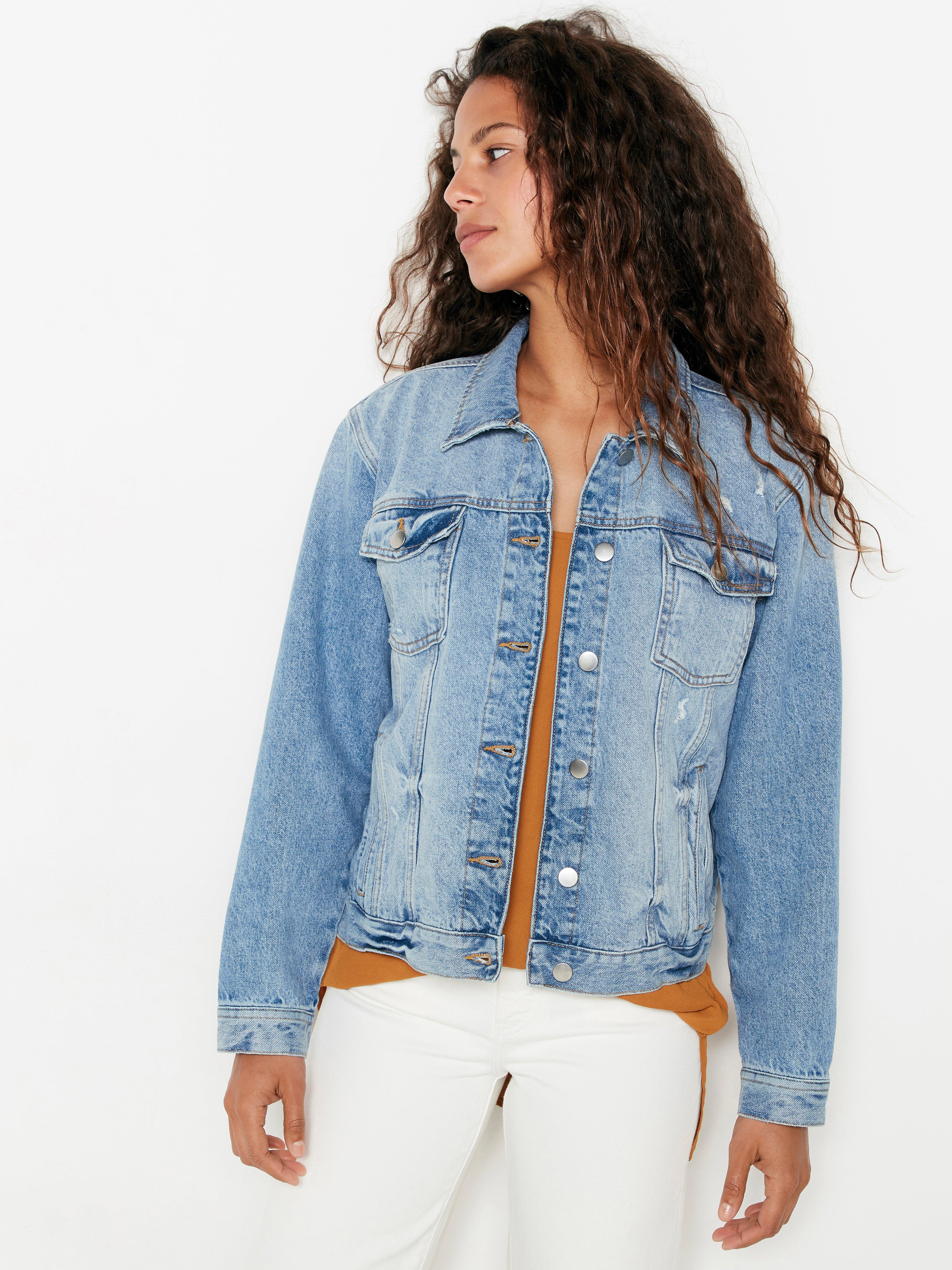 white one piece dress with denim jacket