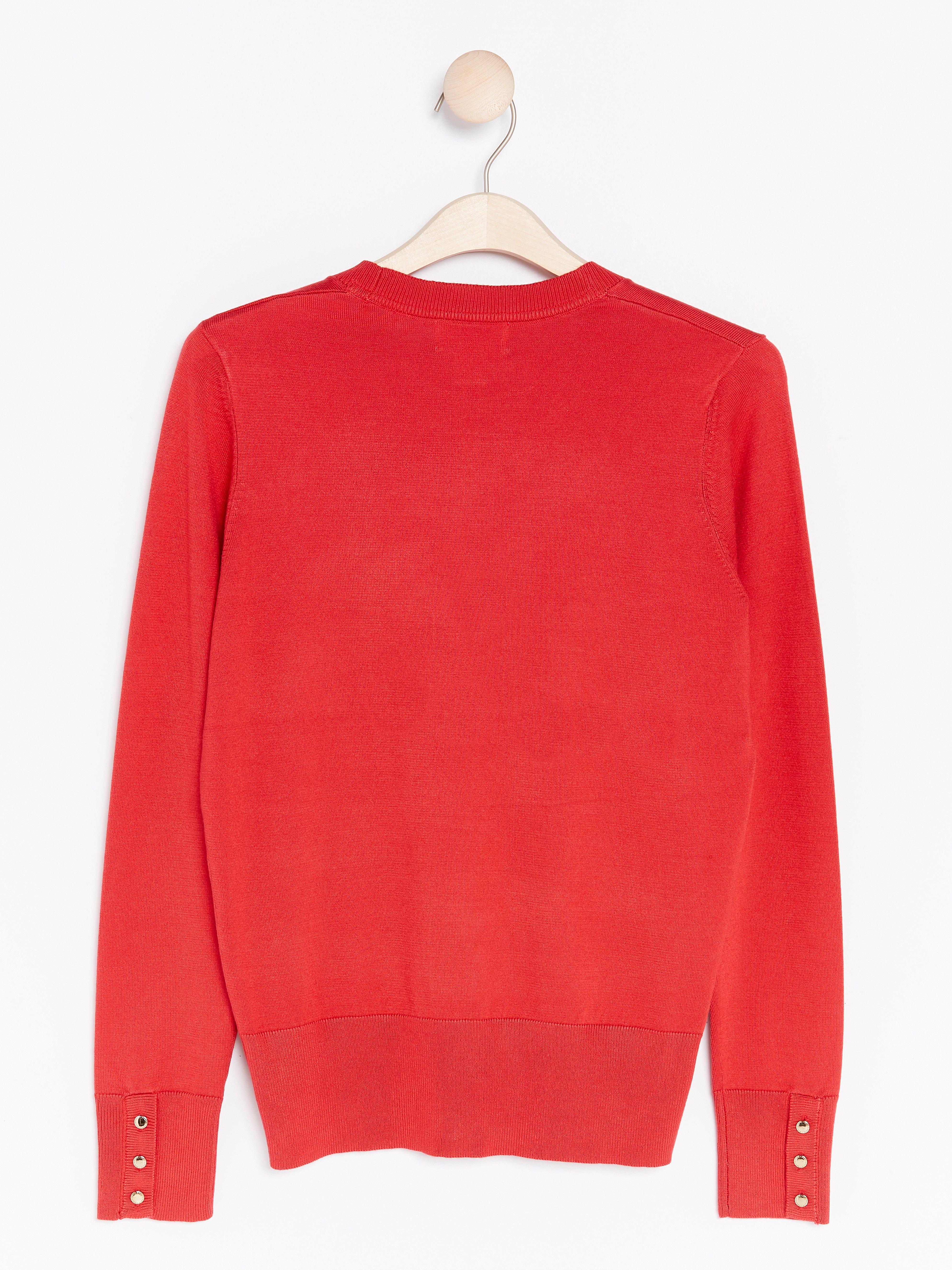 red fine knit jumper