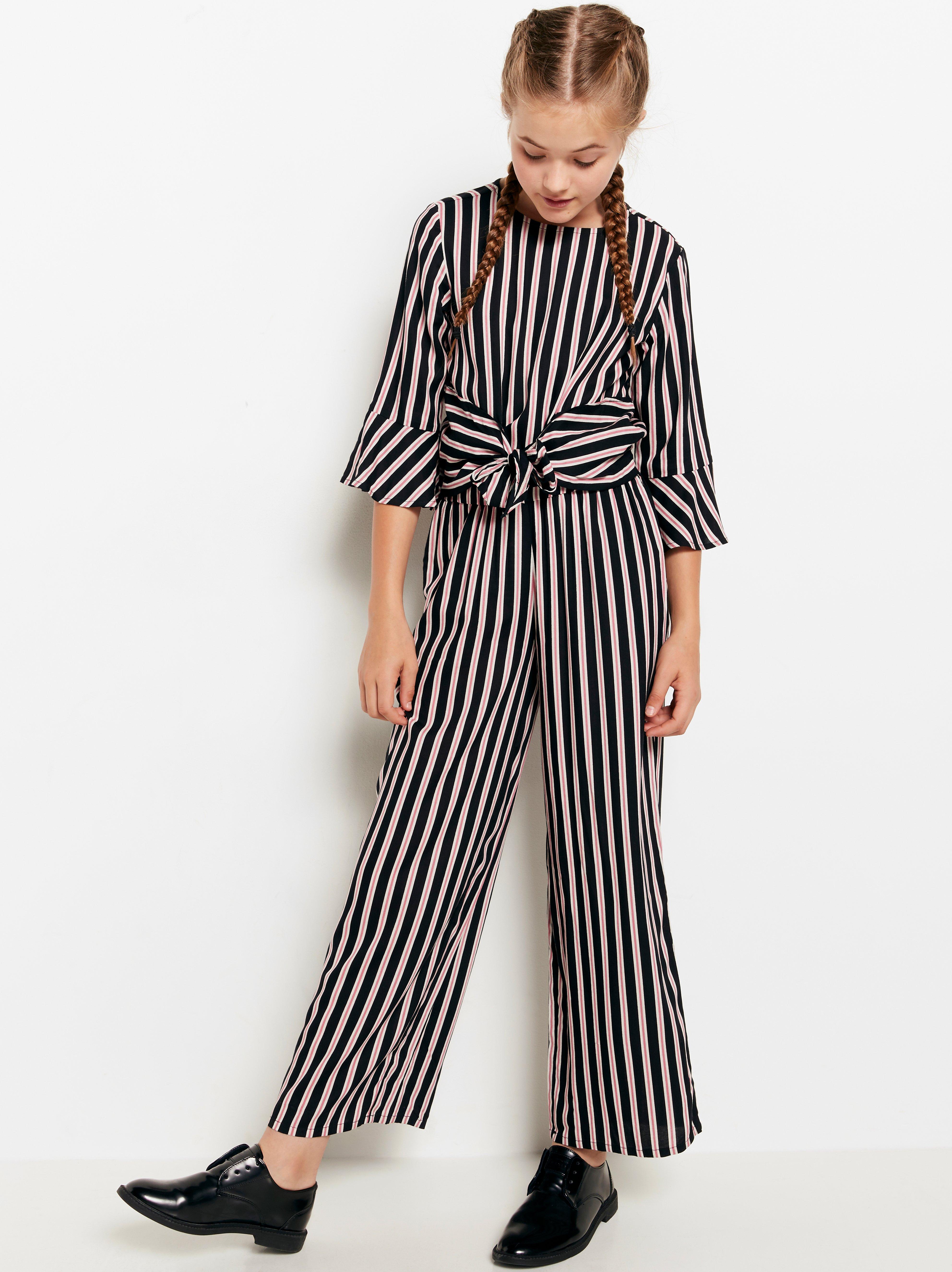 pink and black striped jumpsuit