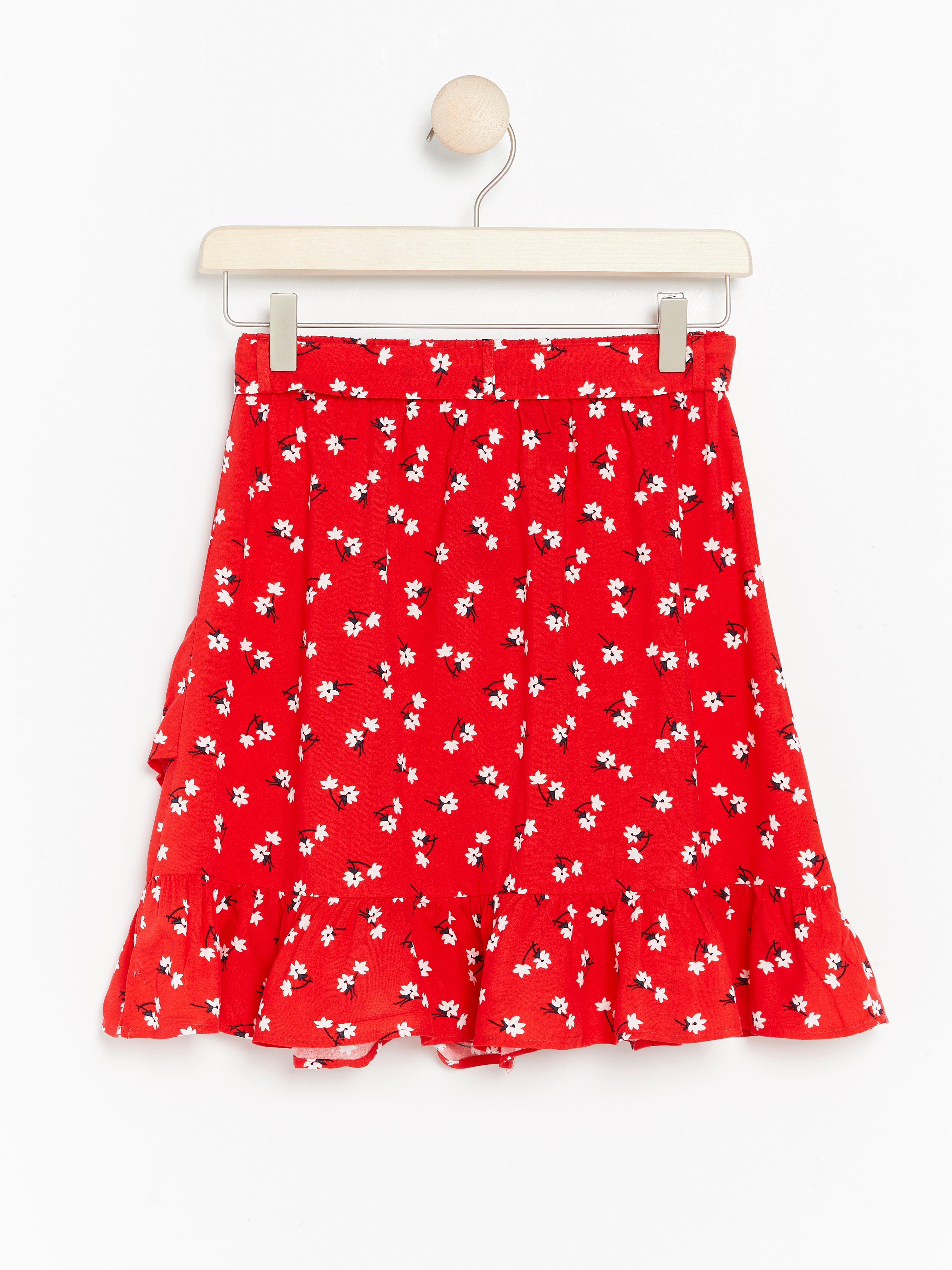 red floral skirt