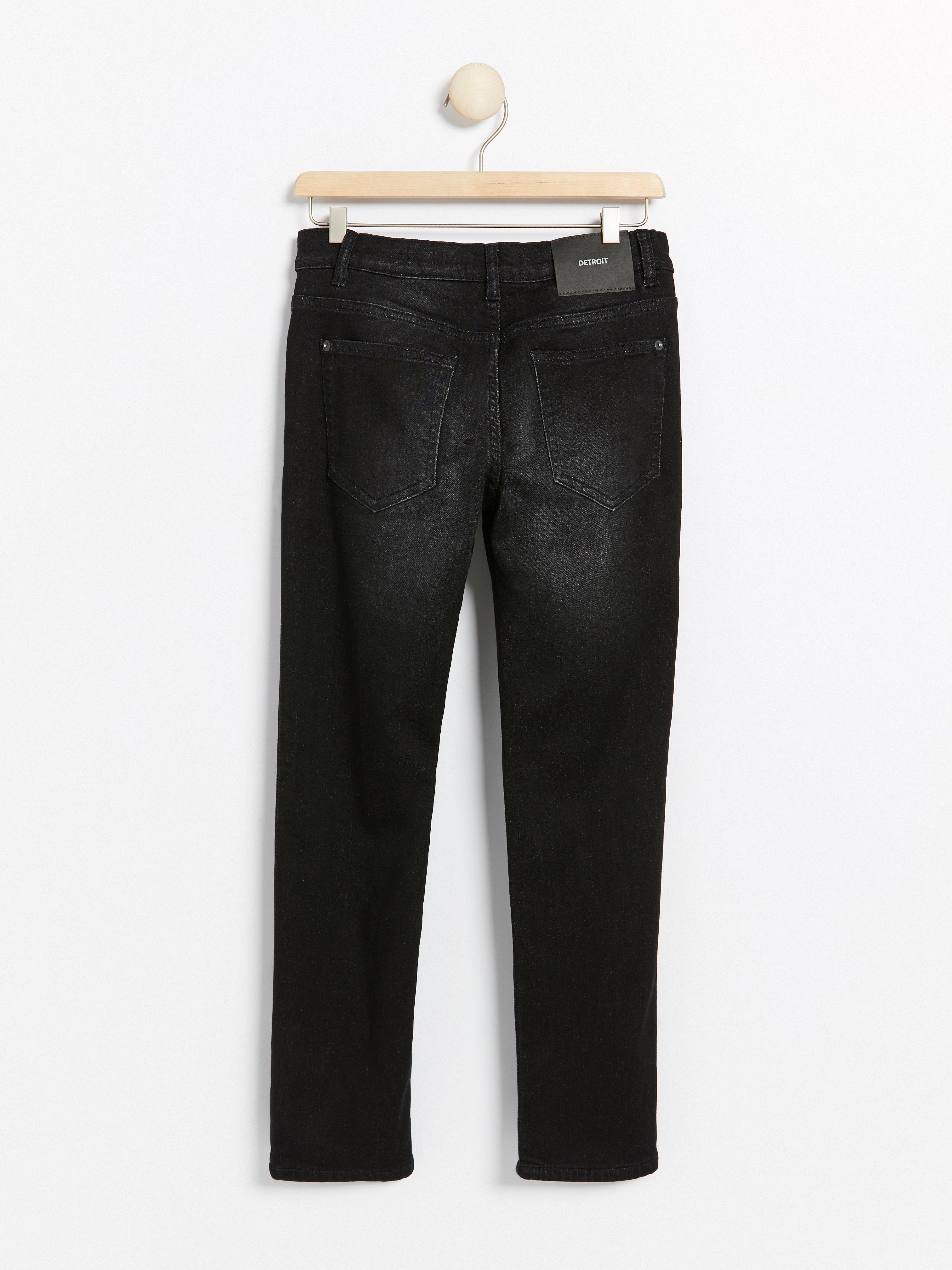 black lined jeans