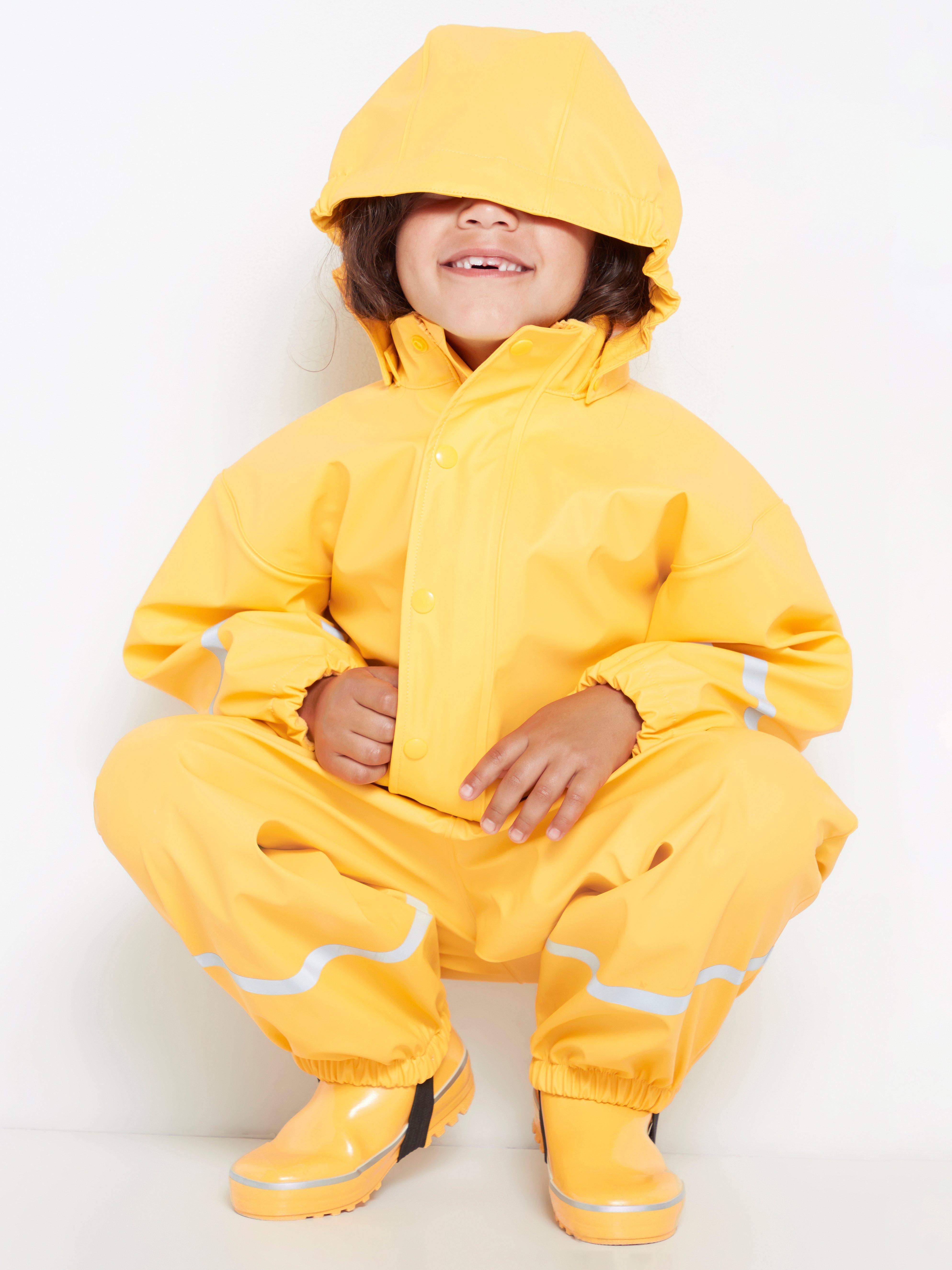 yellow rain suit with hat