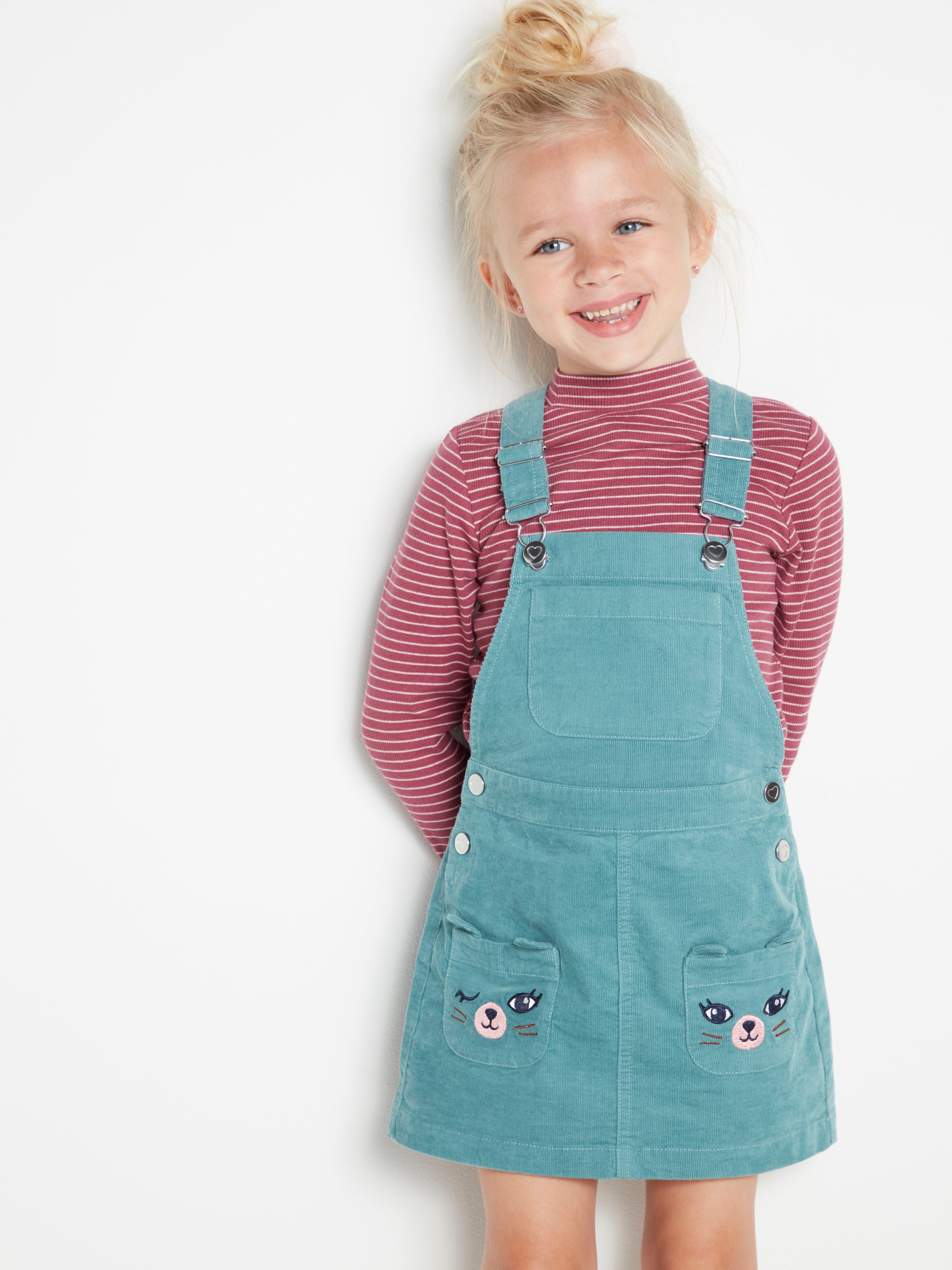 Turquoise corduroy dungaree dress