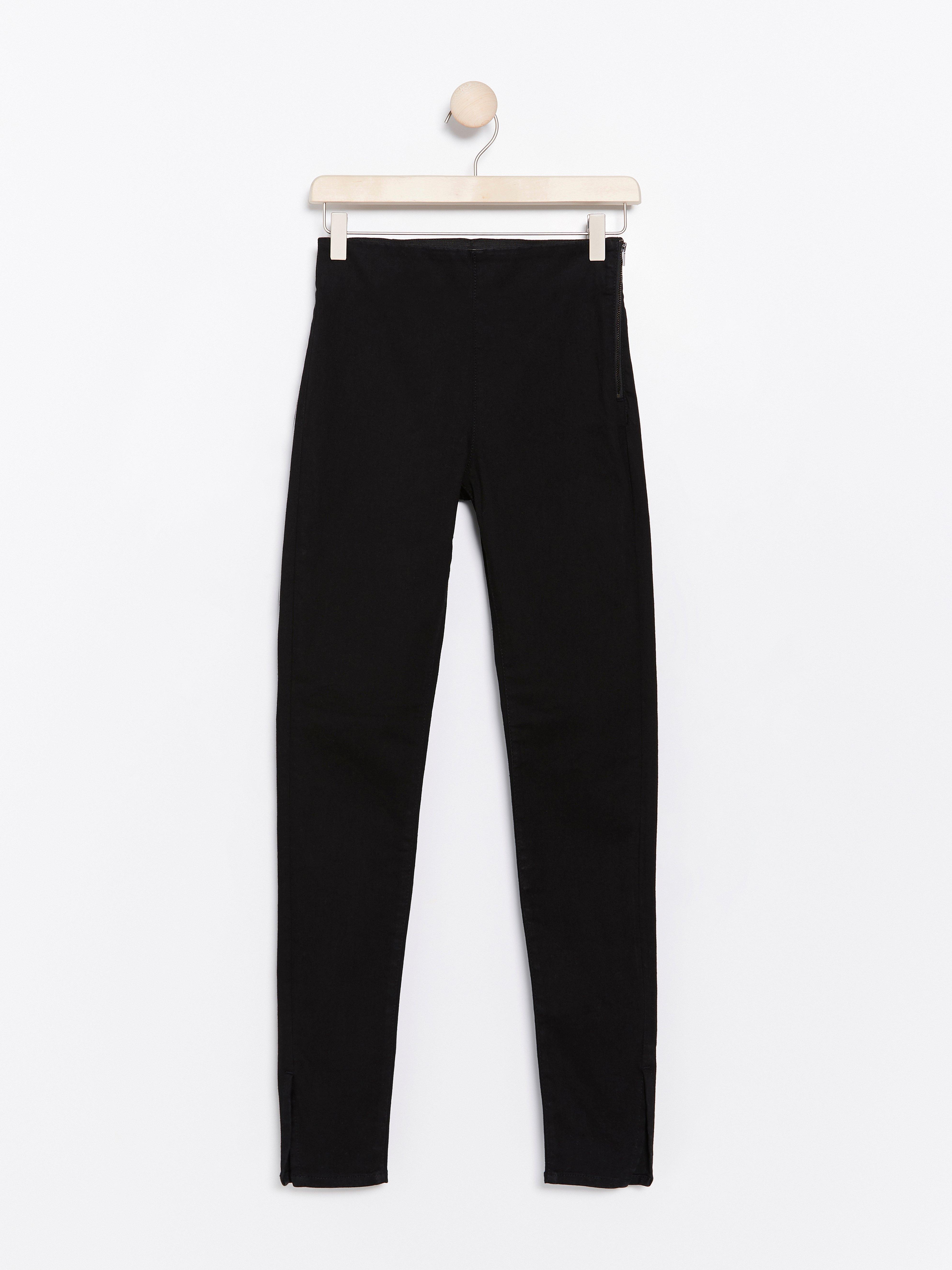 high waisted black slim trousers