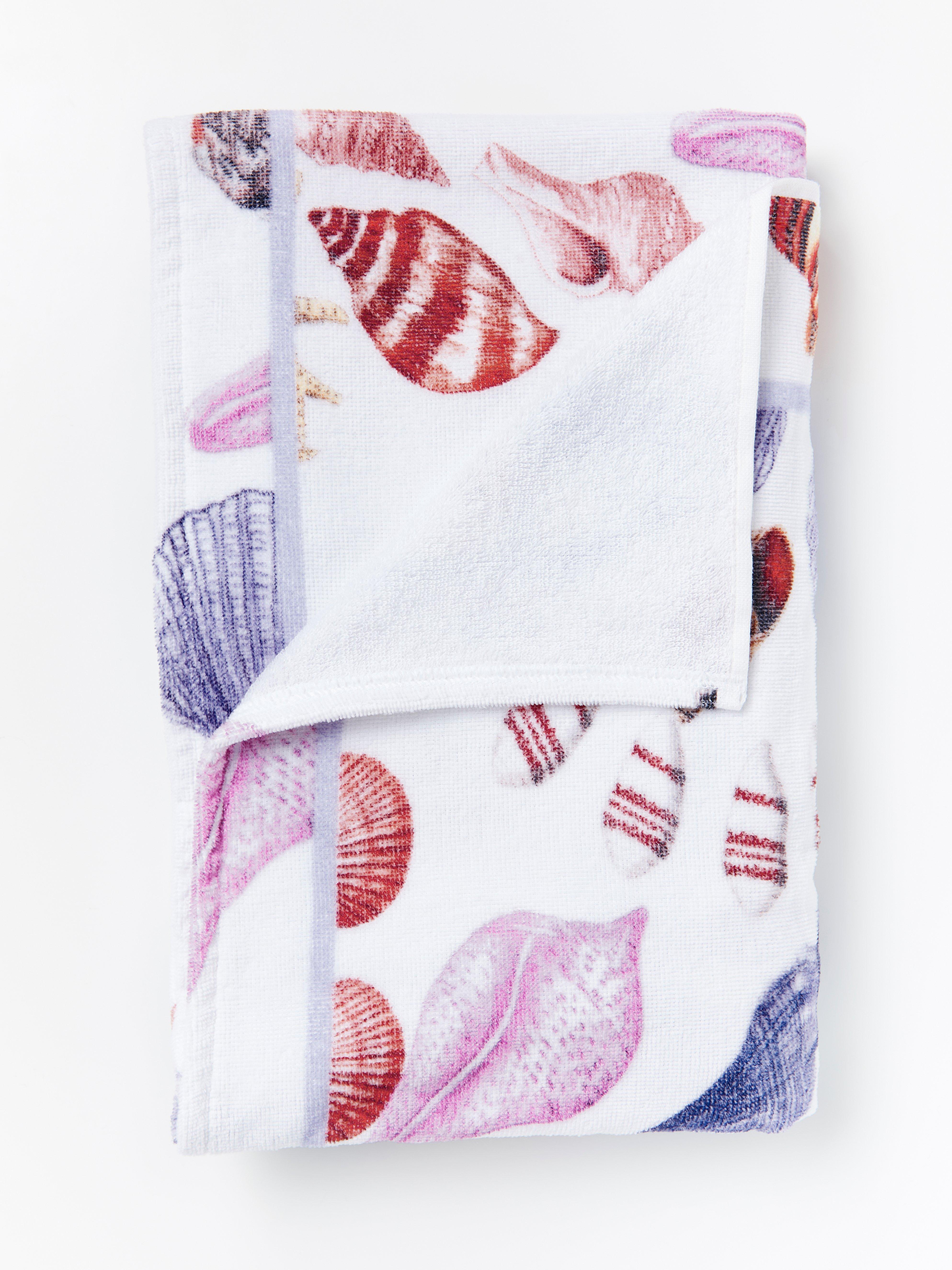 pink and white beach towels