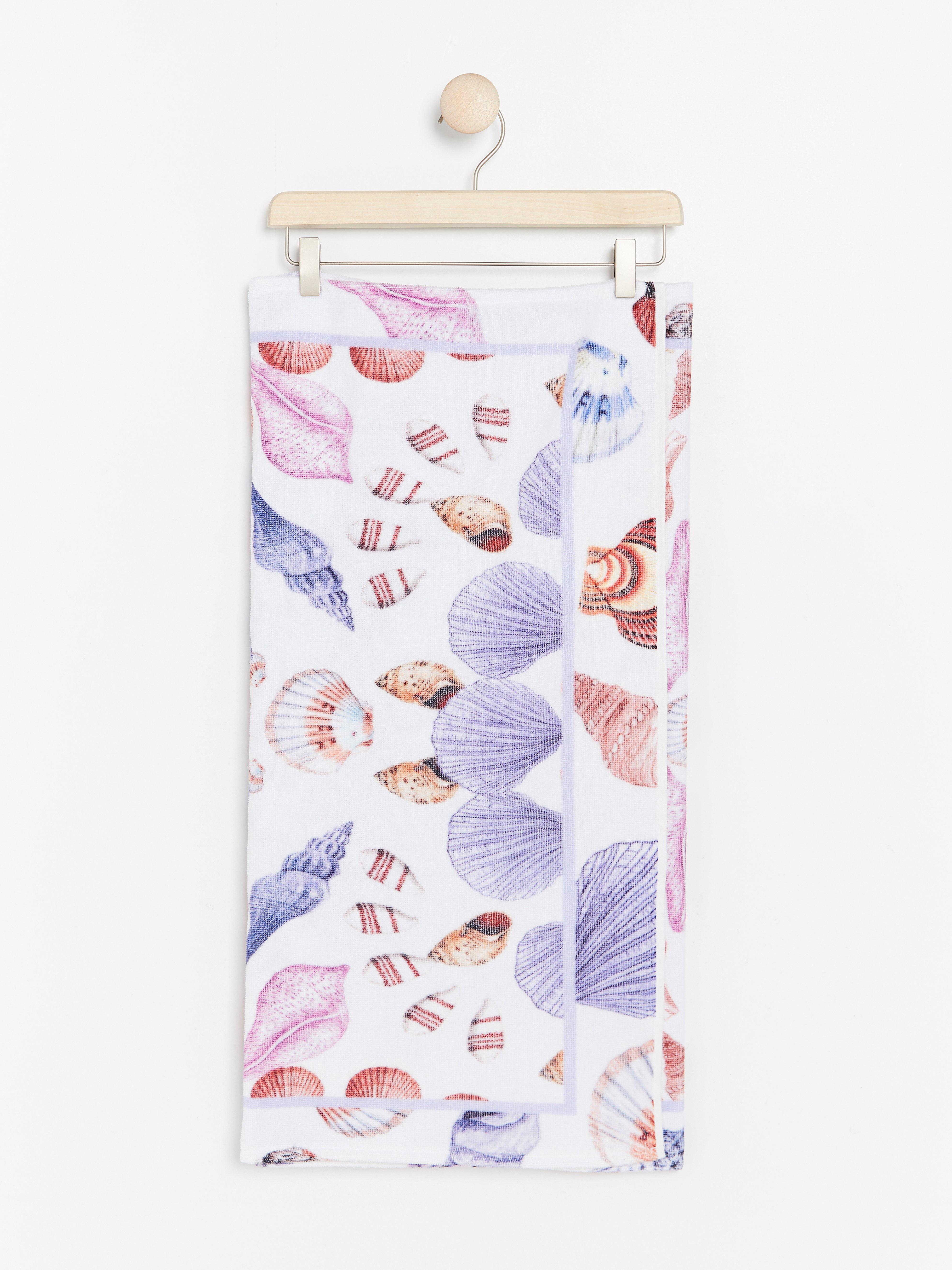 pink and white beach towels