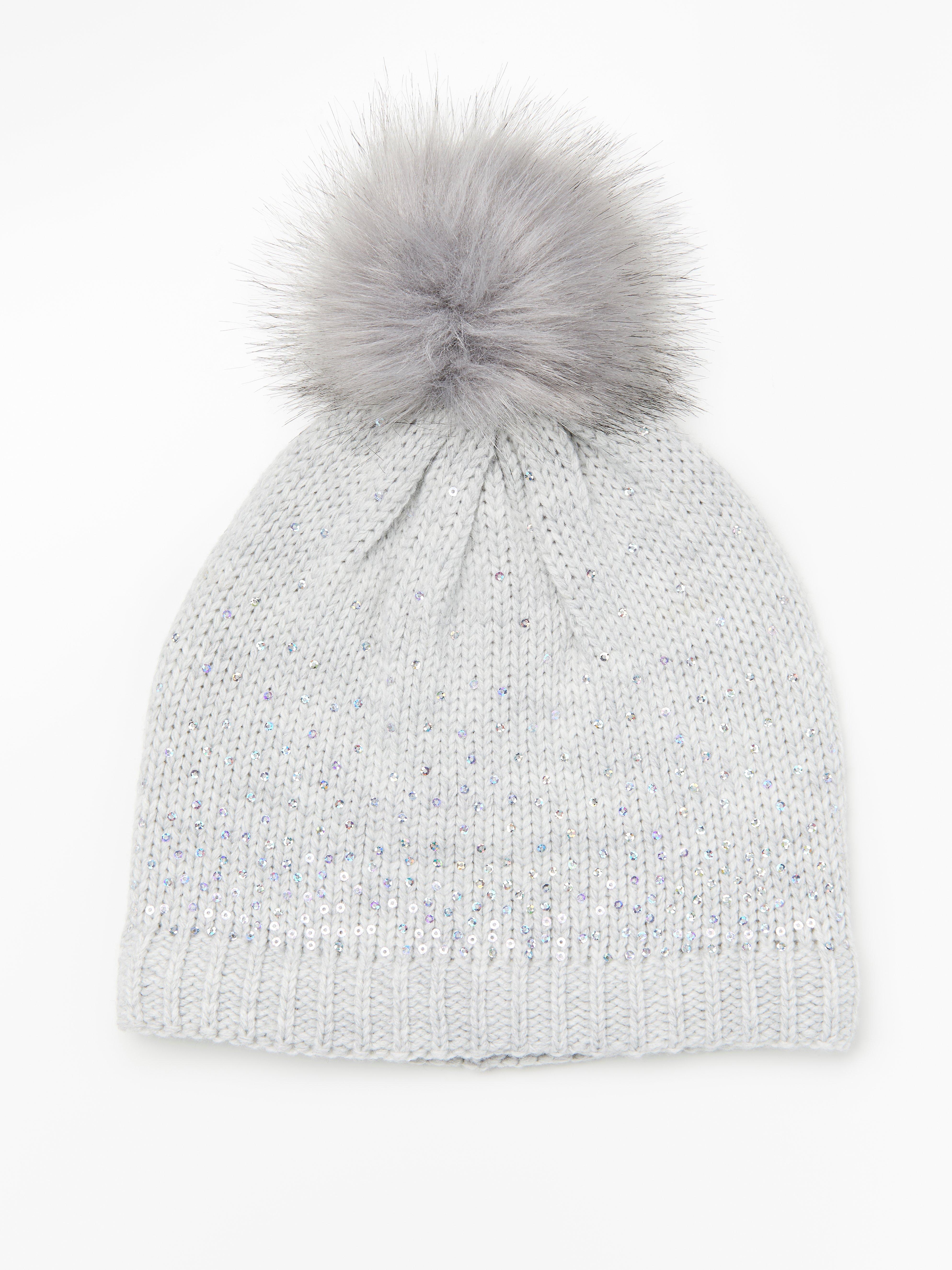 cap with pom pom on top