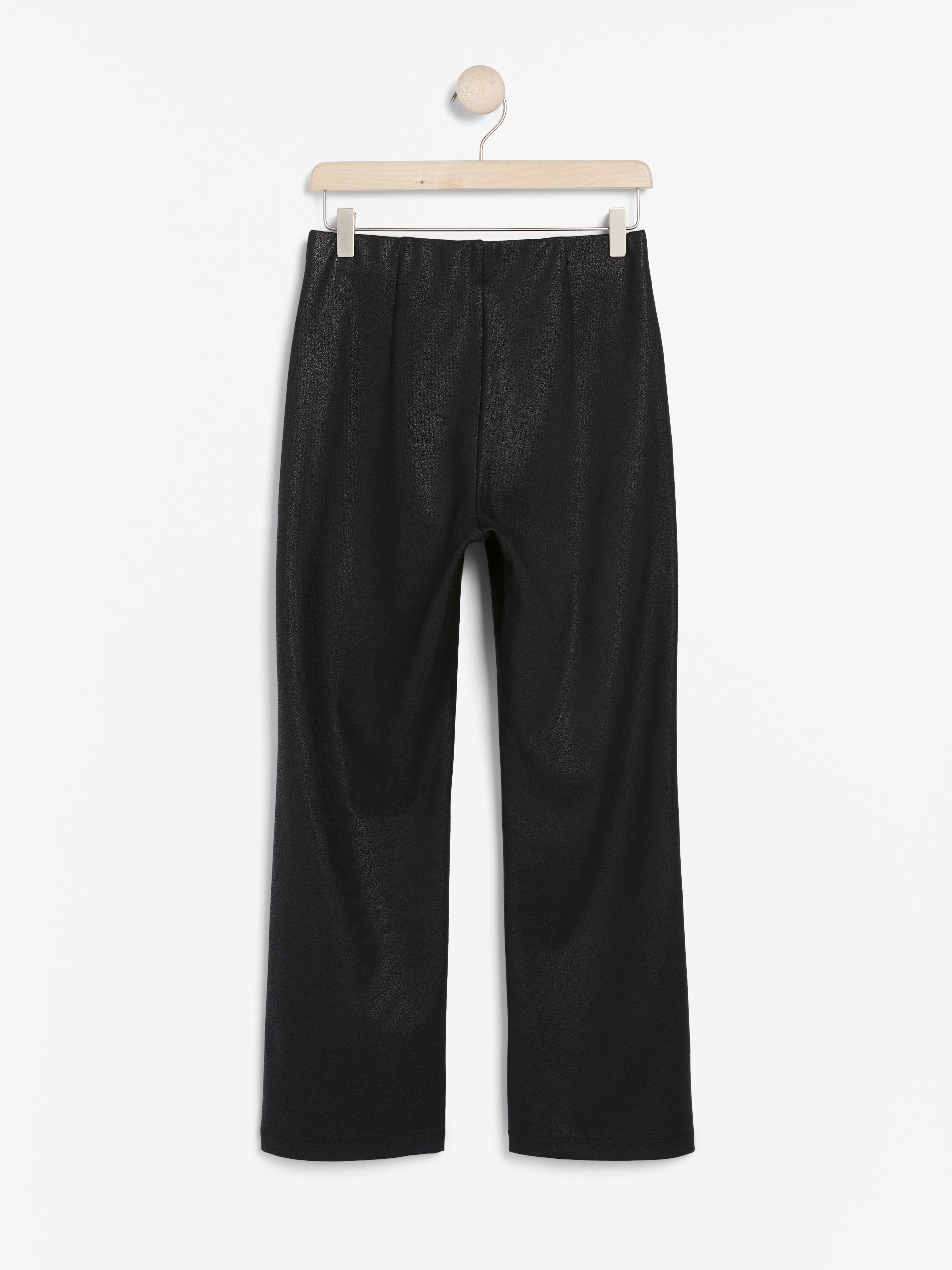 coated black trousers