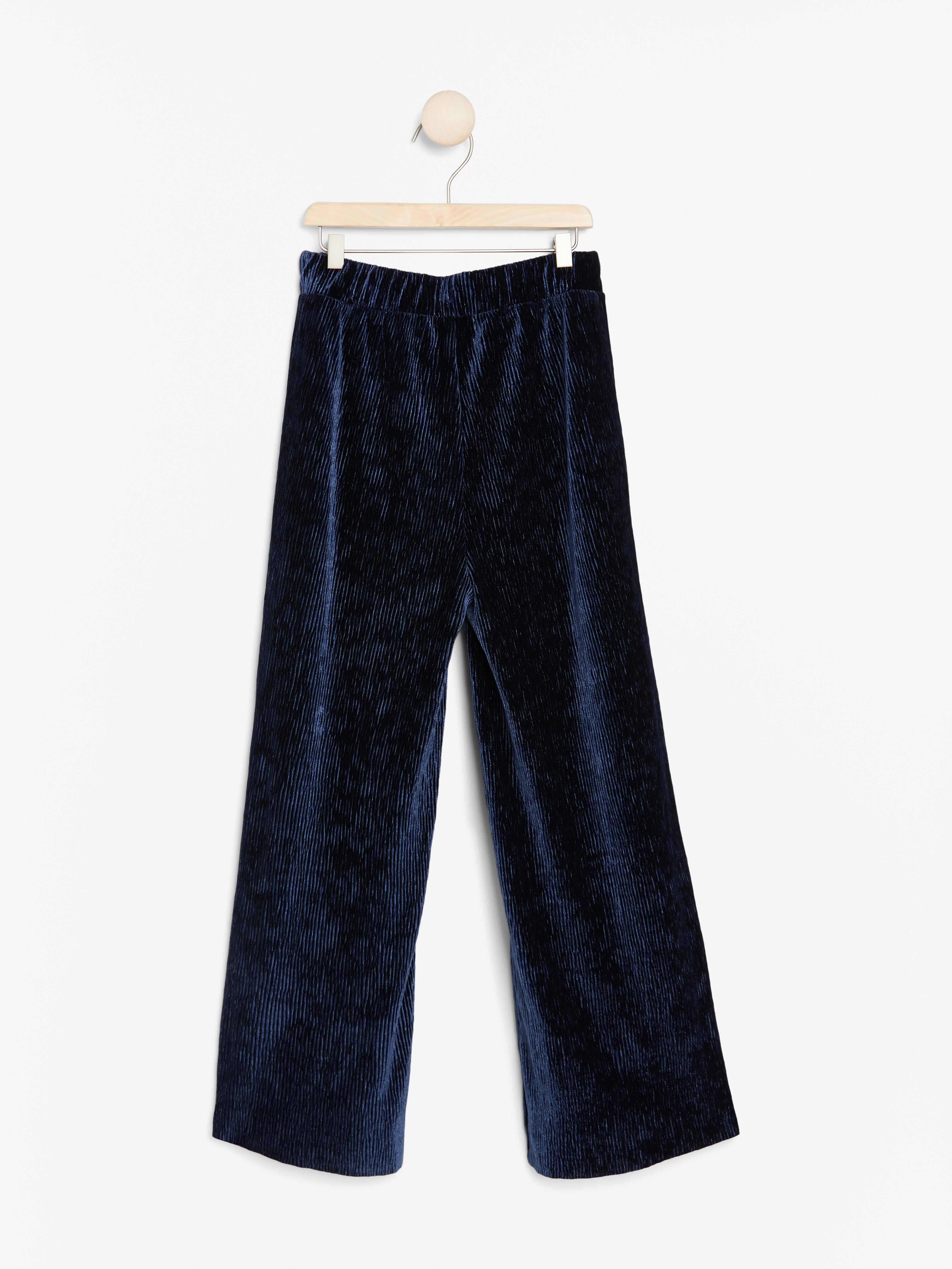 dark blue velvet trousers