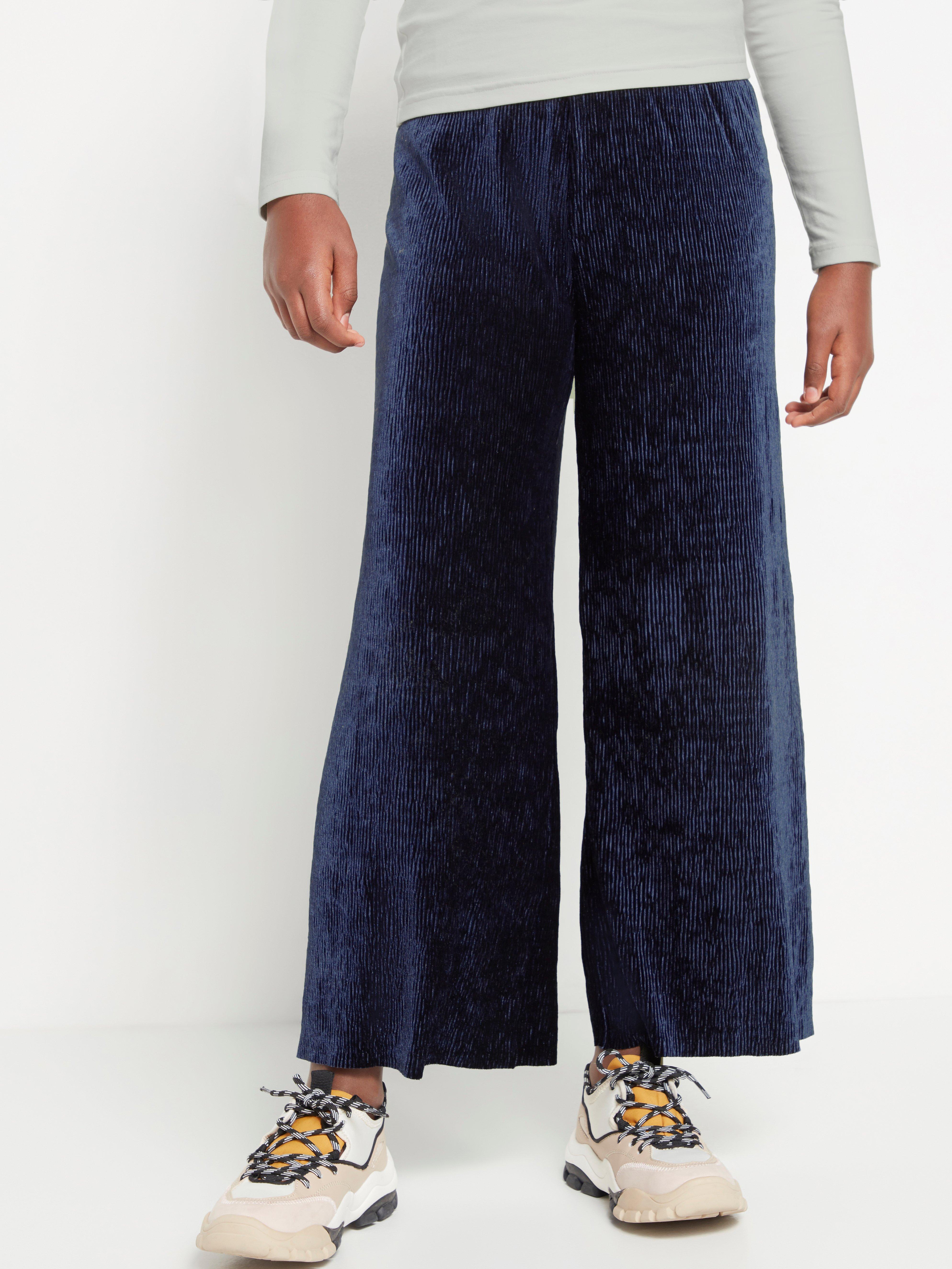 dark blue velvet trousers