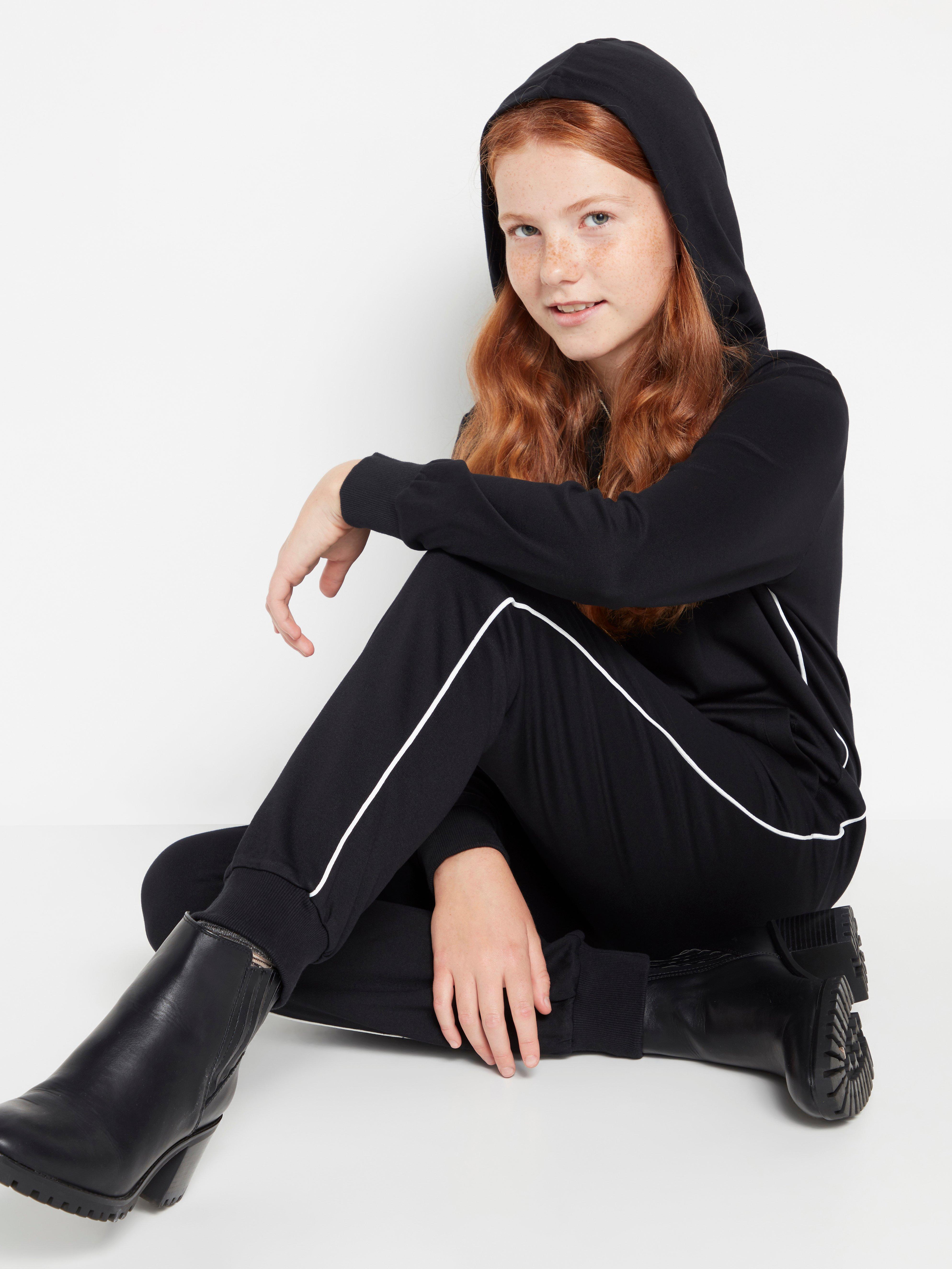 black jumpsuit with white stripe on side