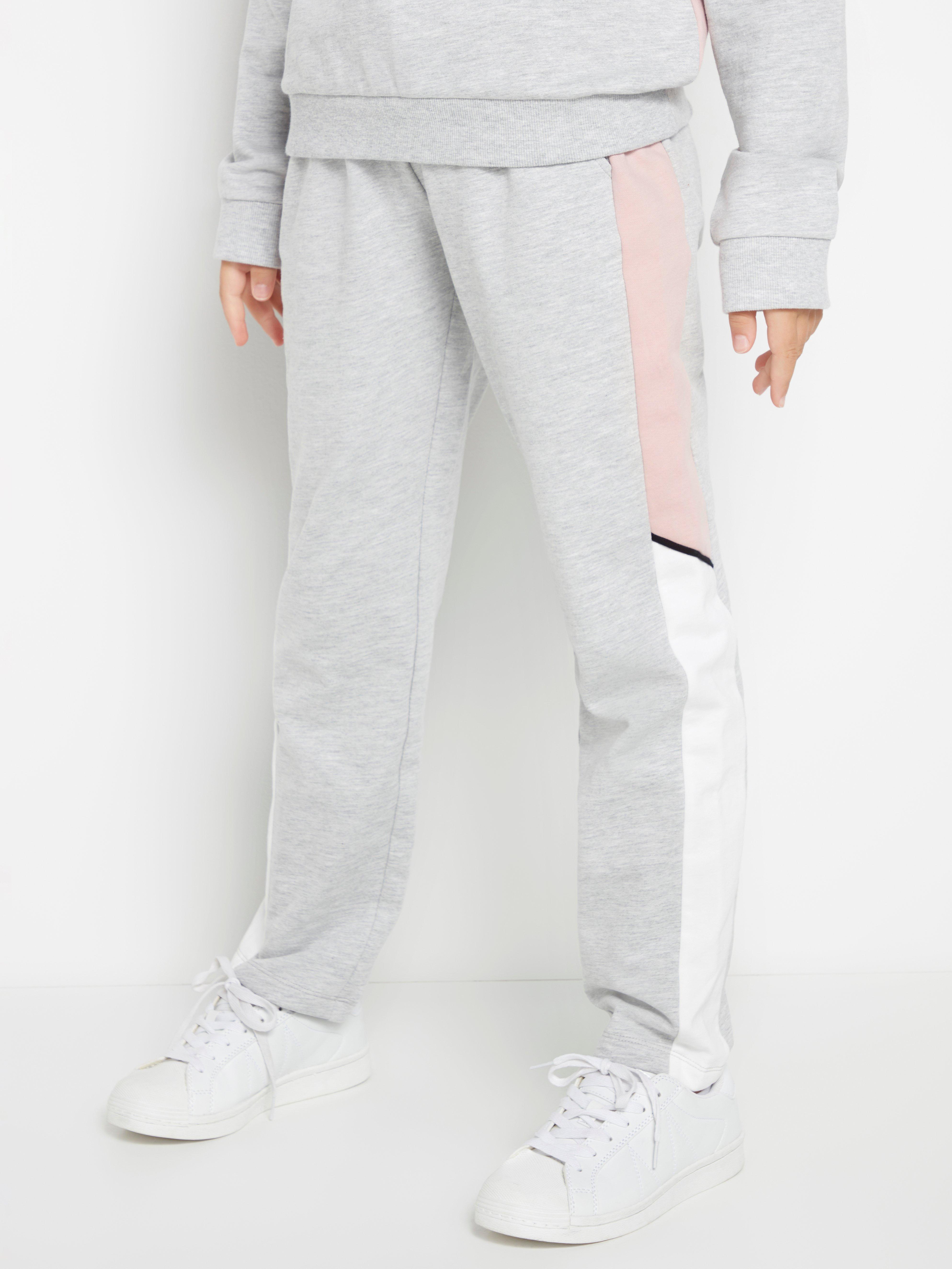 grey sweatpants with white stripe