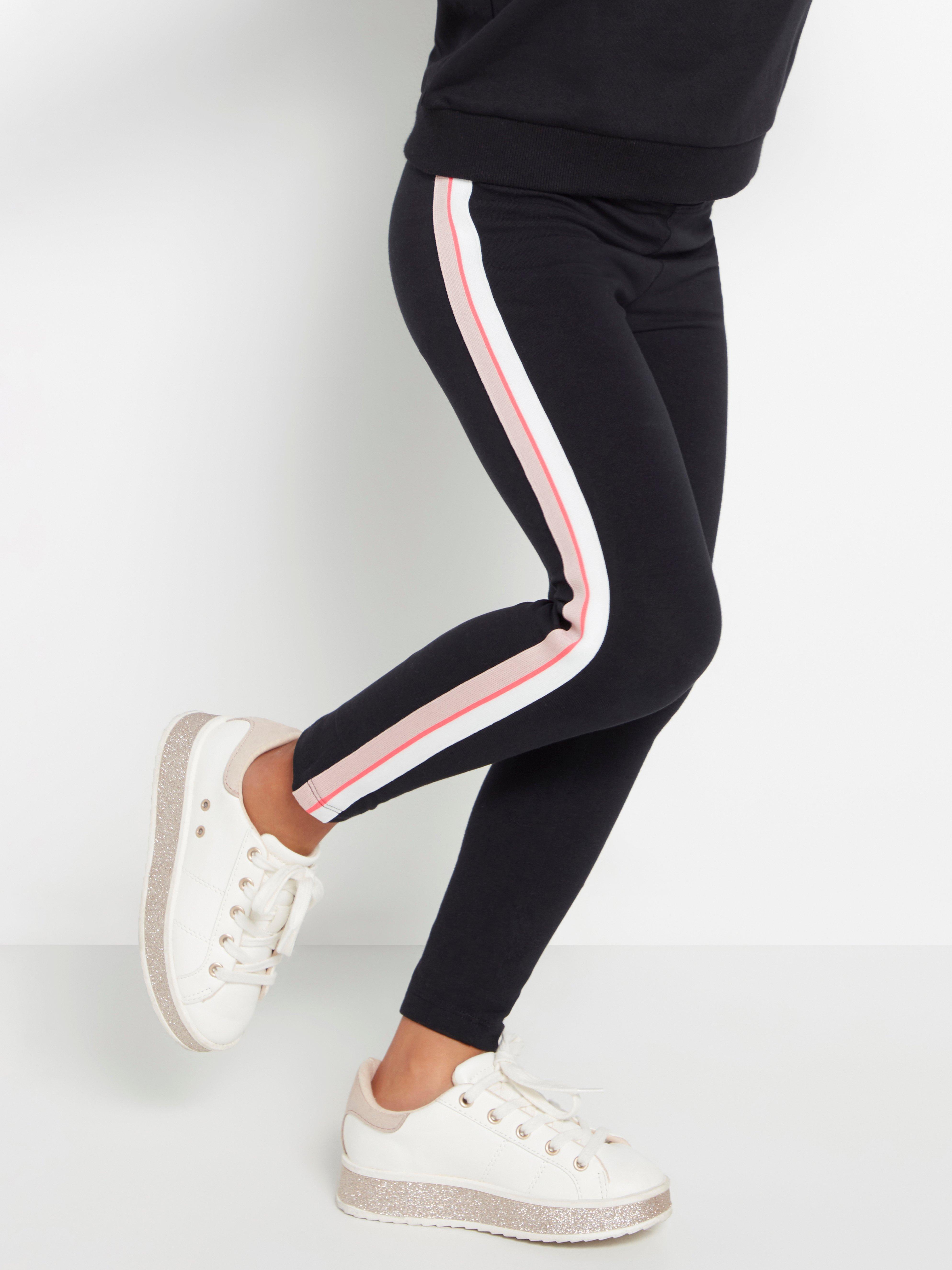 Black leggings with pink and white side stripes