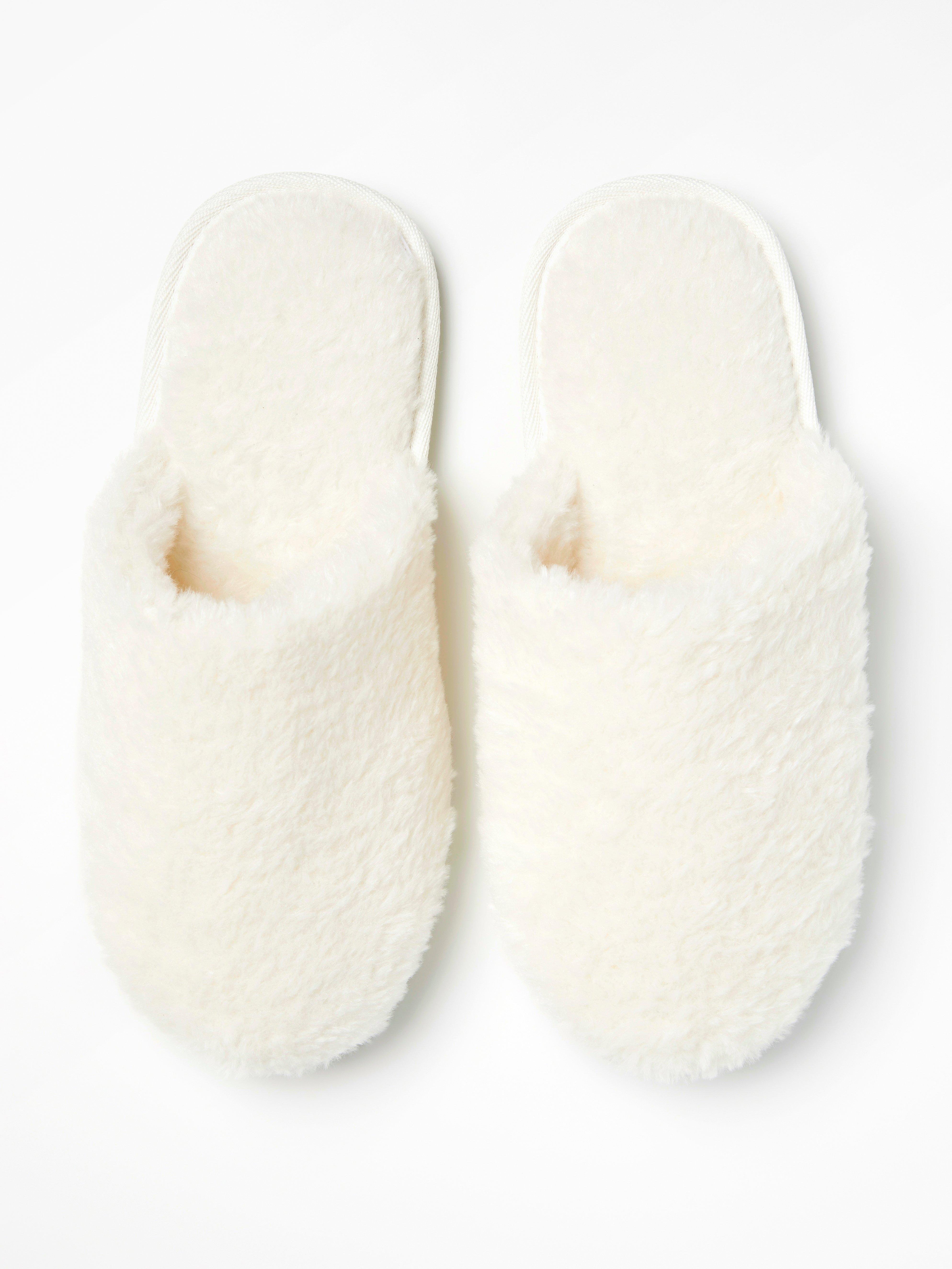 white fur slippers