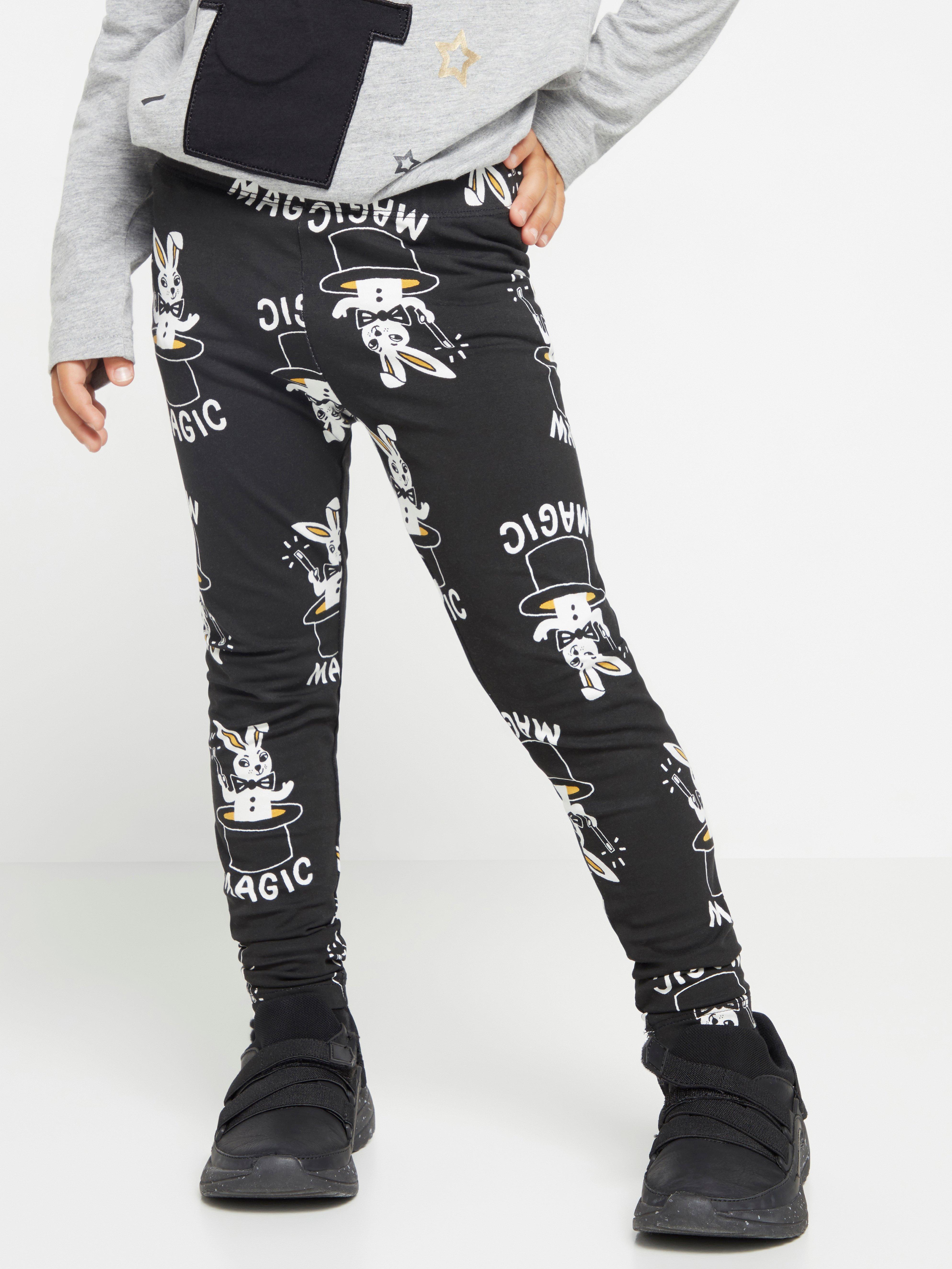 Black leggings with rabbits and magicians' hats