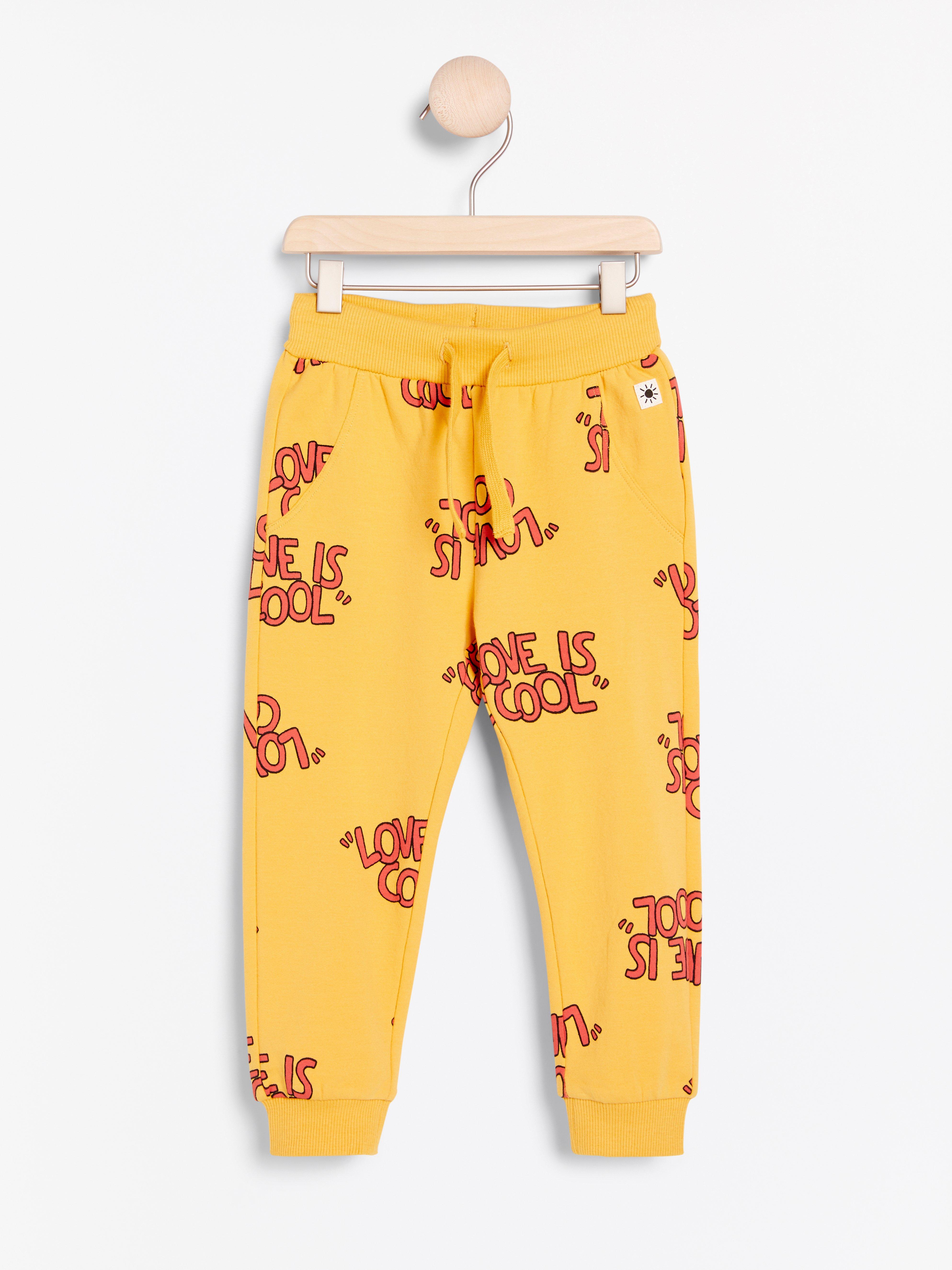 yellow sweatpants and sweatshirt