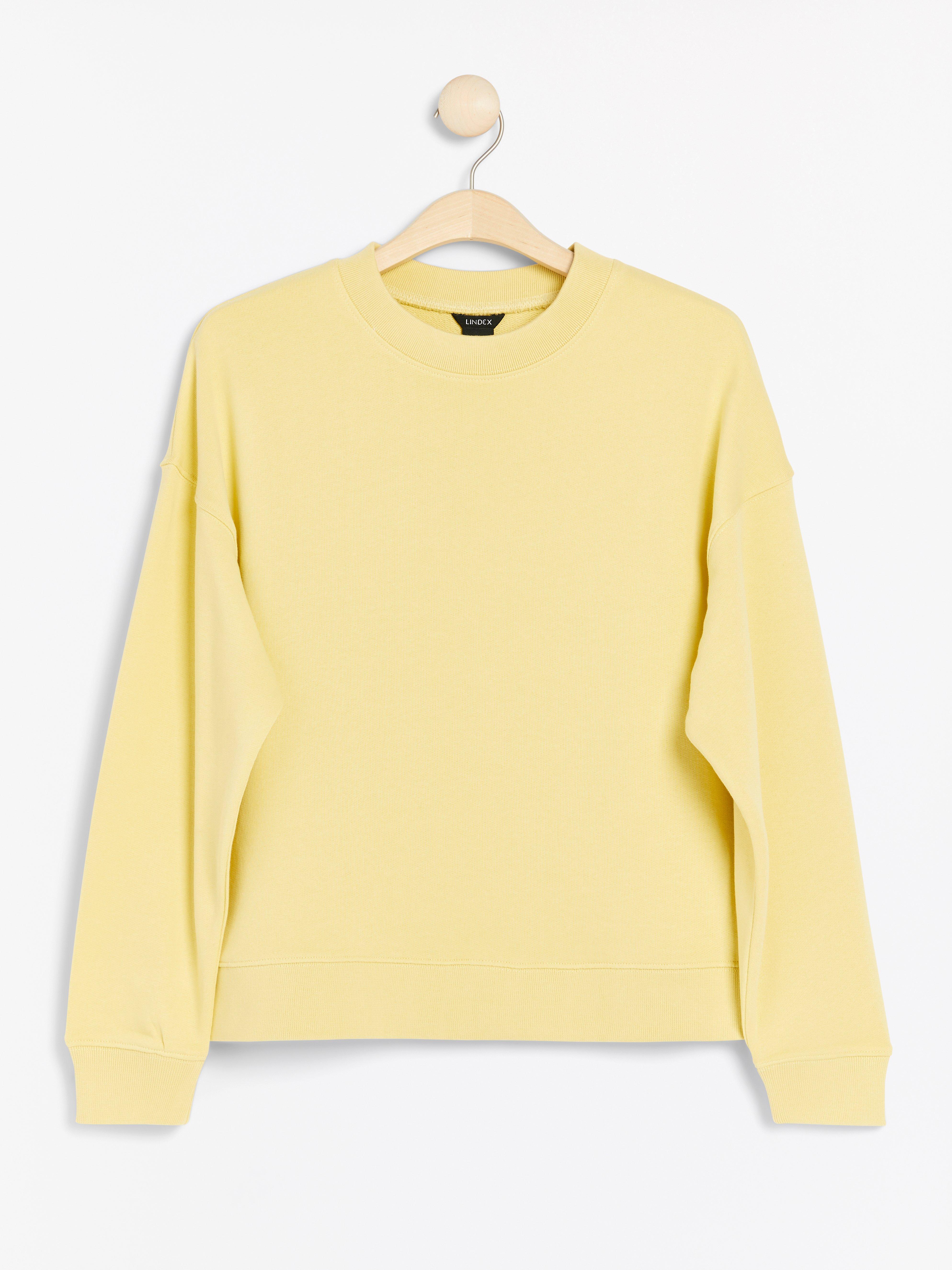 soft yellow sweatshirt