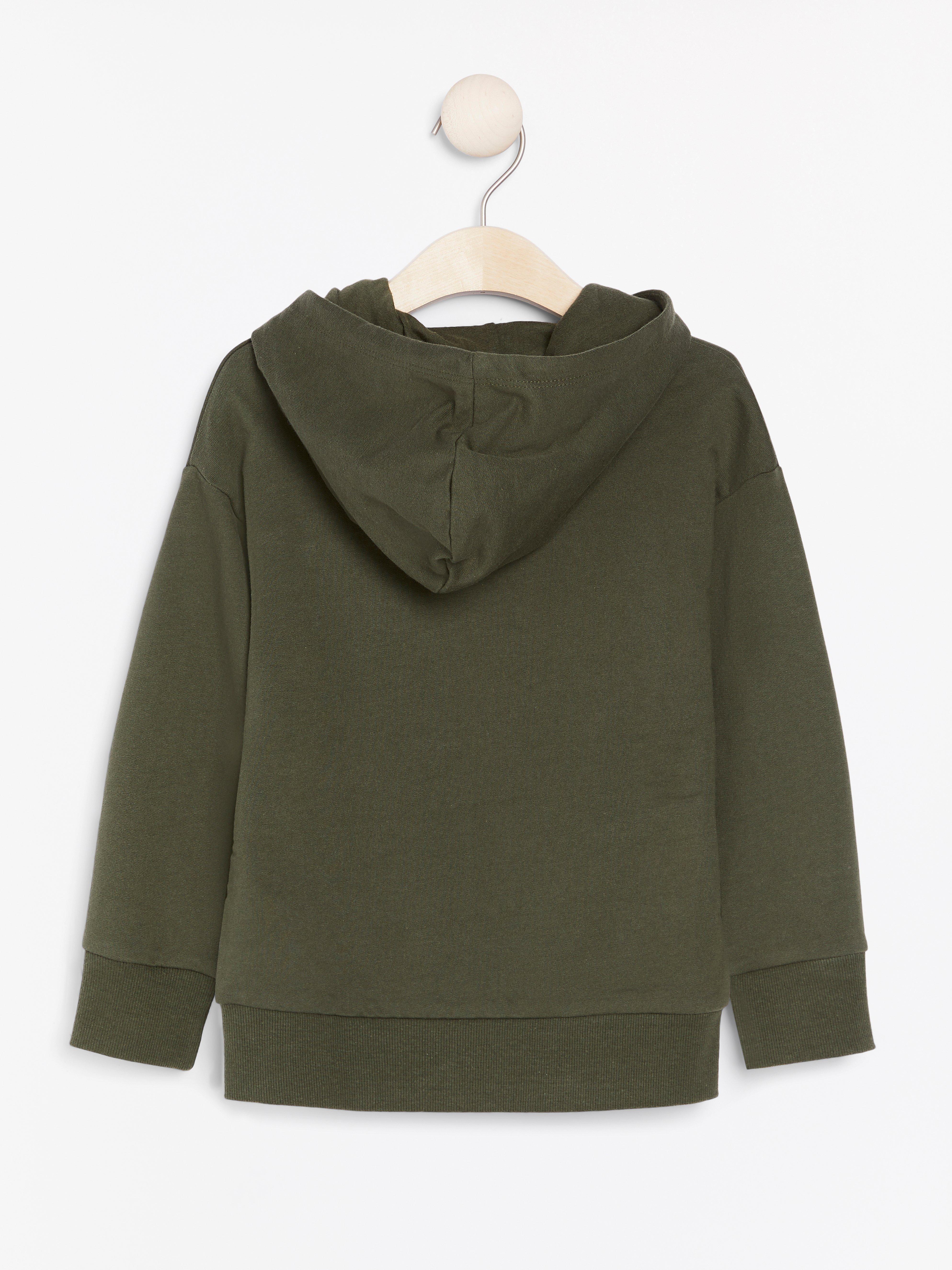 green hooded sweater