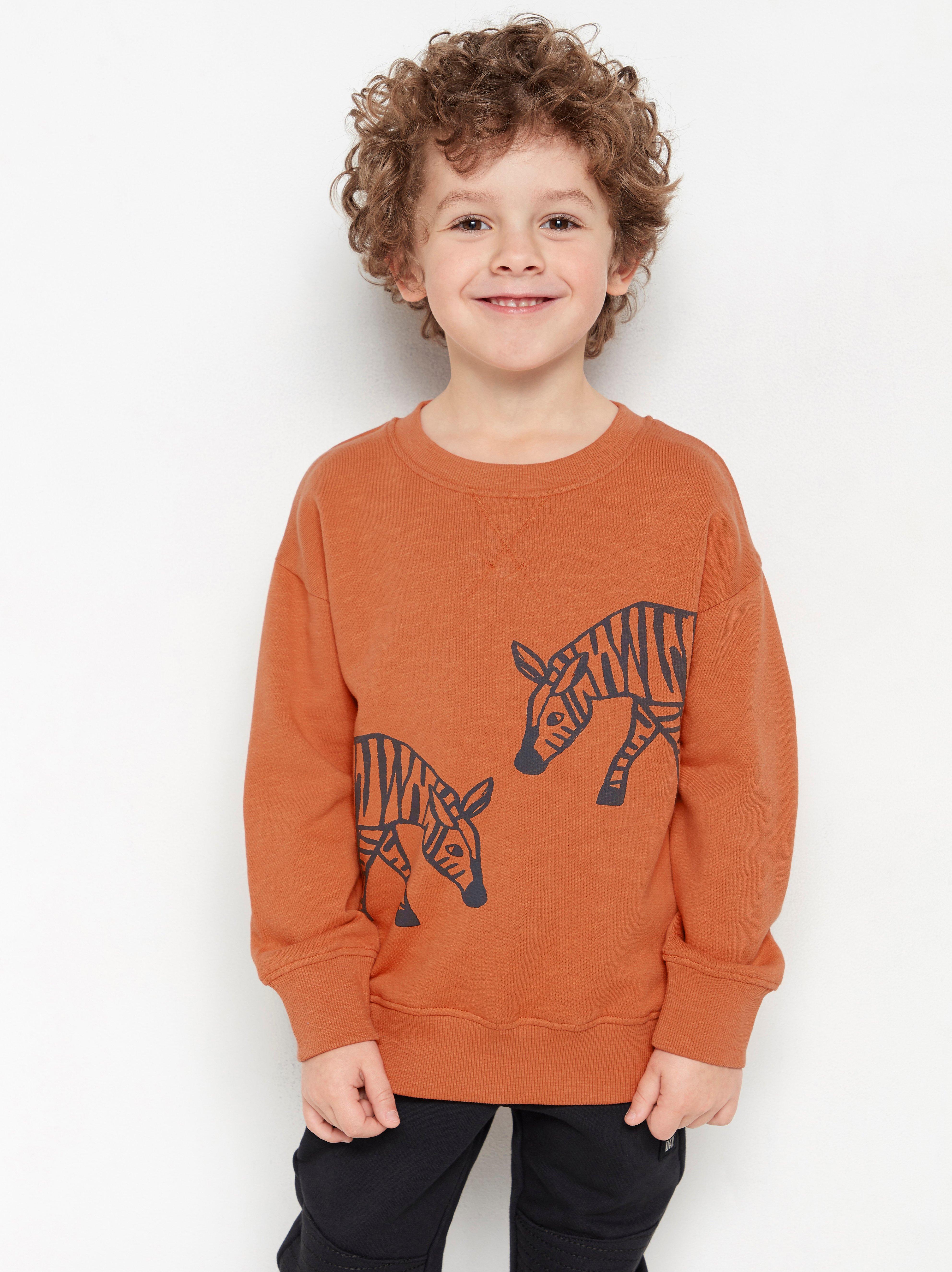 Oversized dark orange sweatshirt with zebra print Lindex Estonia