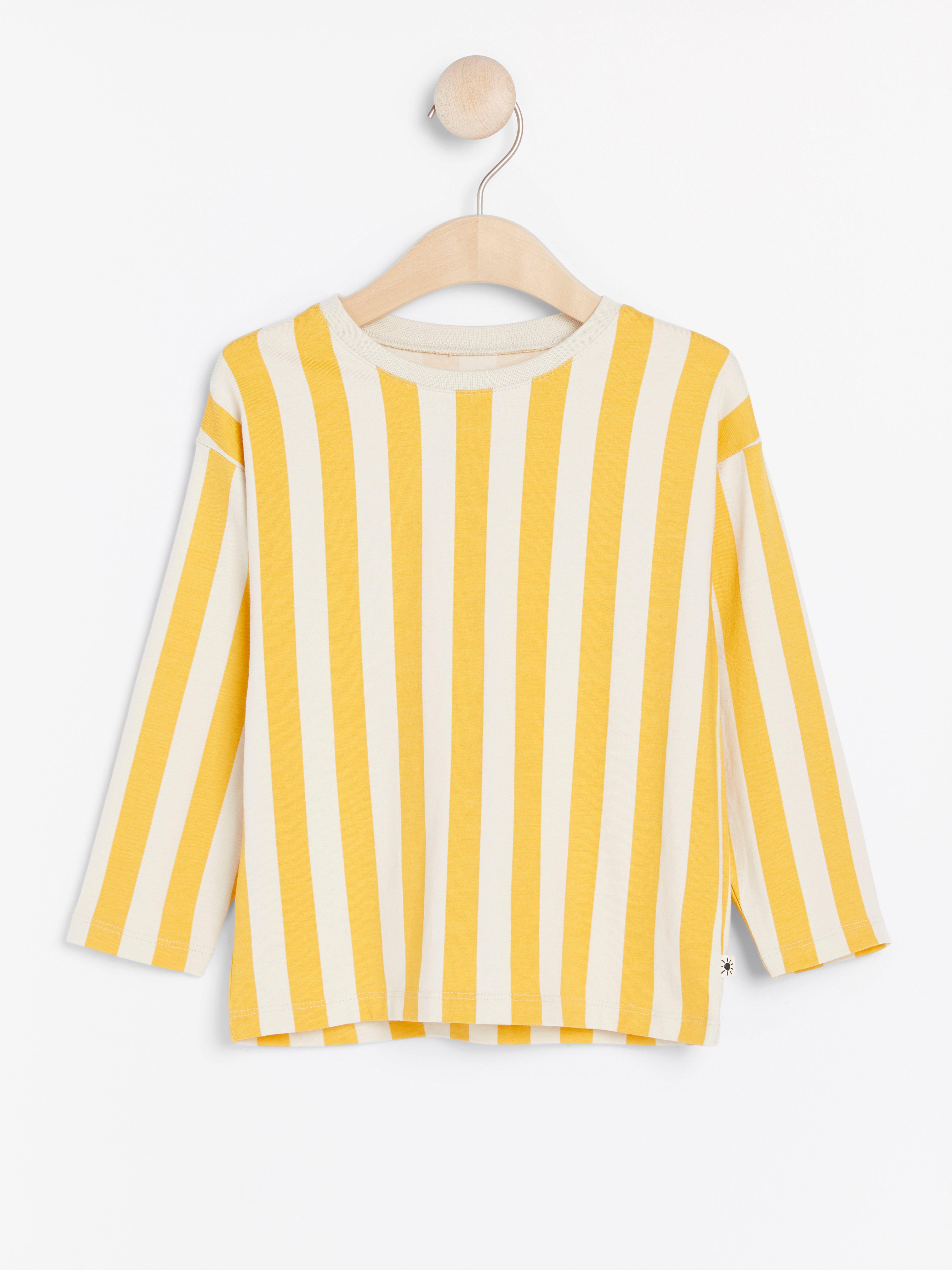 yellow striped long sleeve top