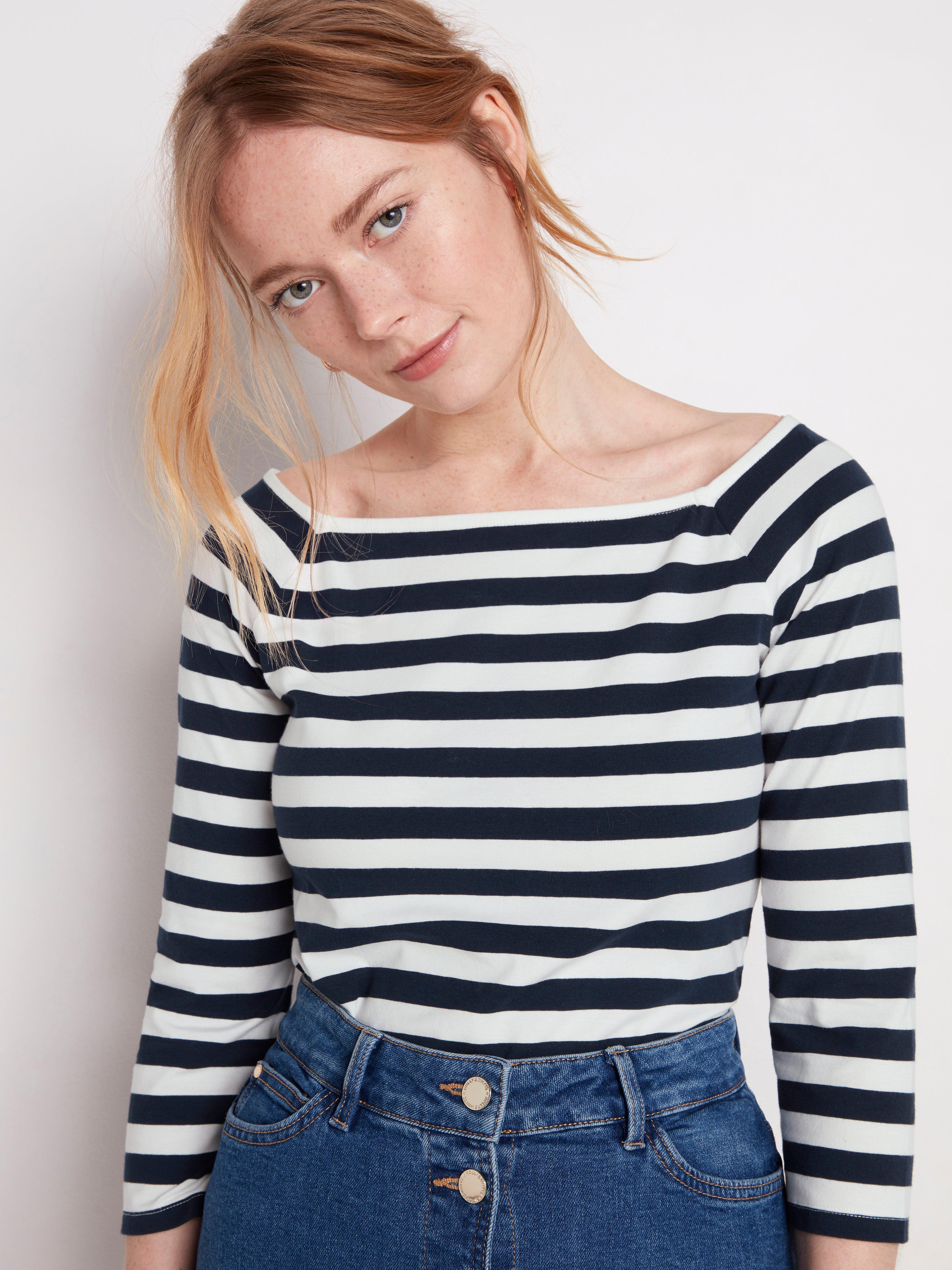 three quarter white jeans