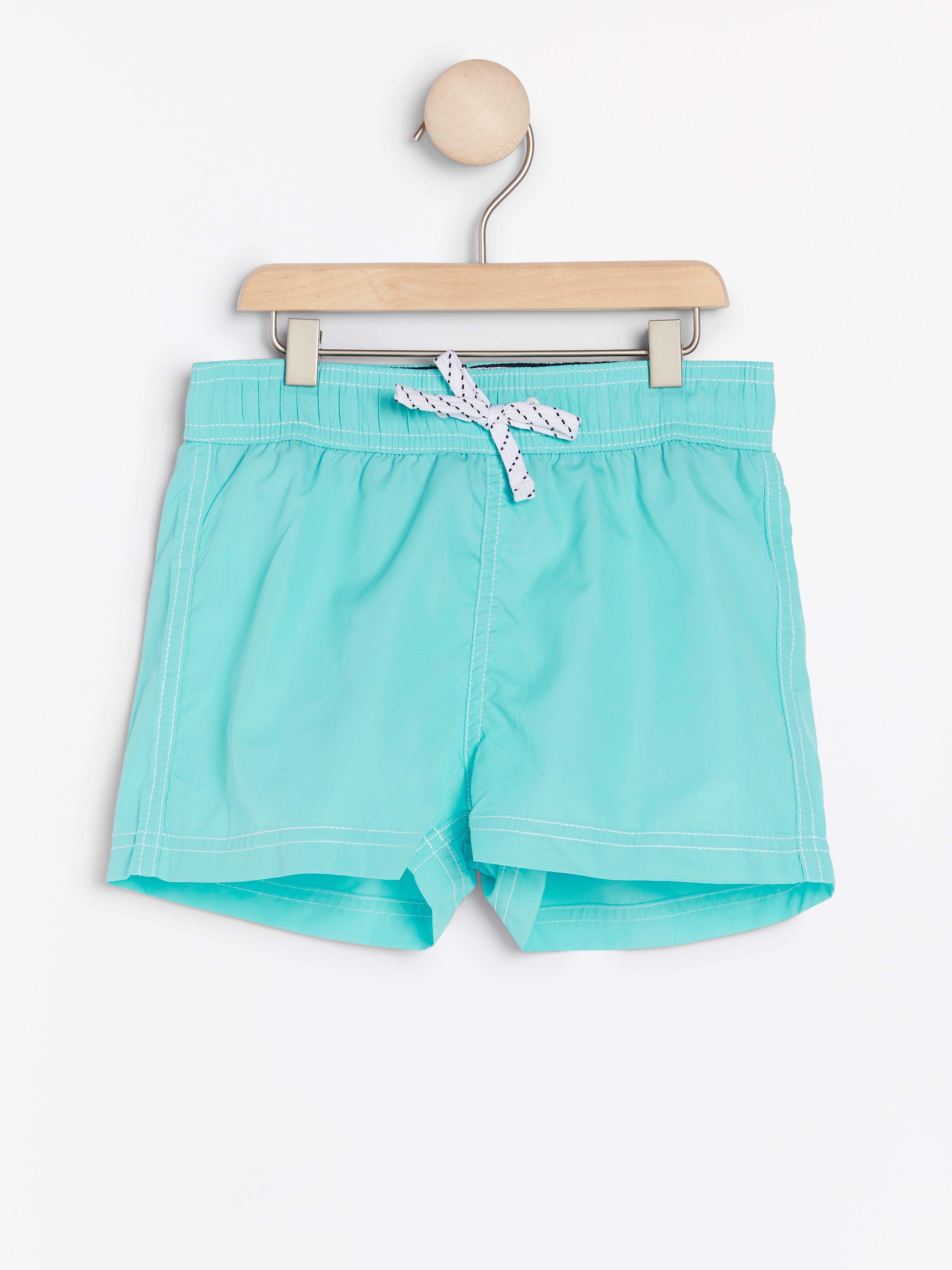 turquoise swim trunks